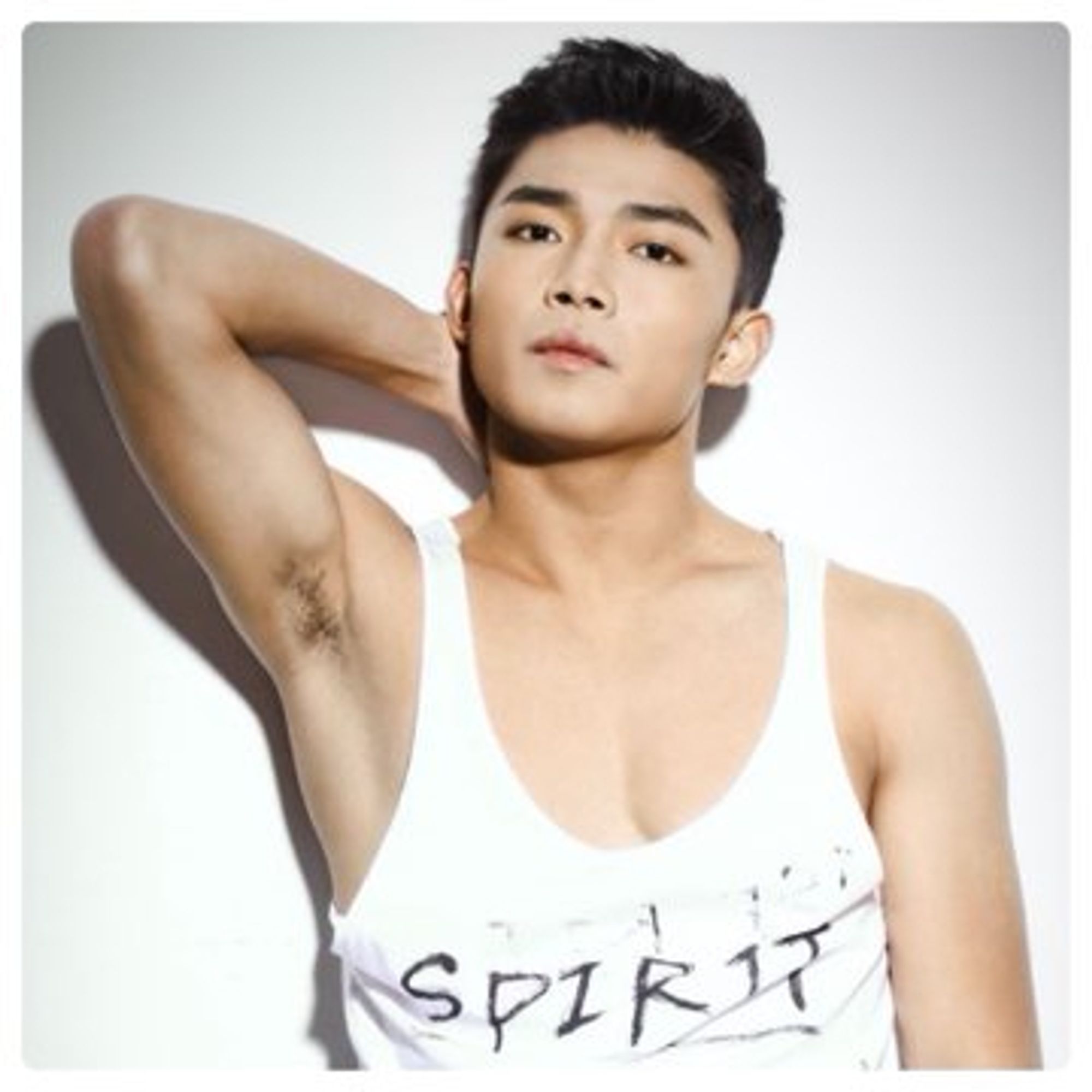 Wang Rong in a white tank