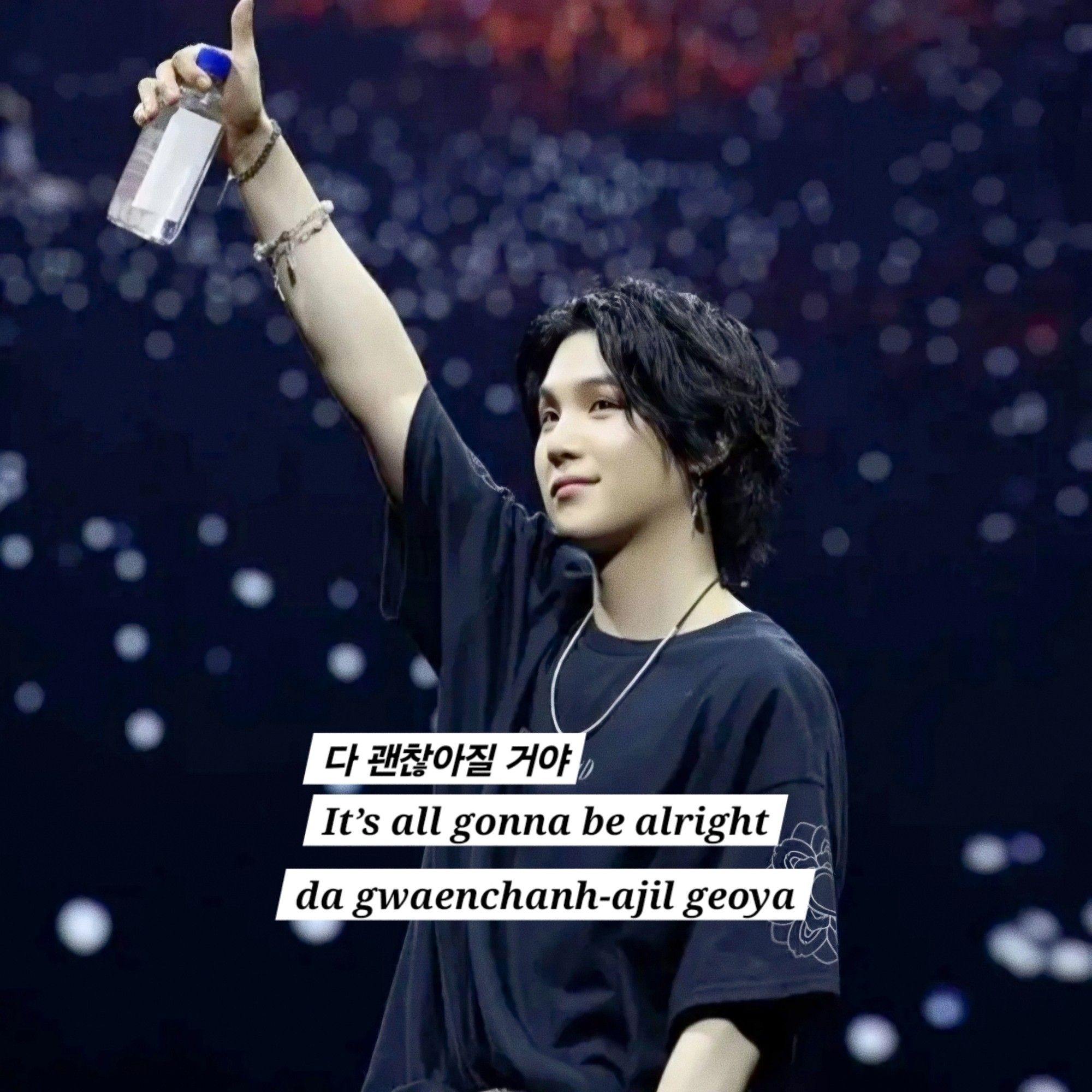 Yoongi at D-DAY tour. On the picture Yoongi is showing a thumbs up and holding a bottle.
It's also represented the expression It's all gonna be alright/Everything will be okay in korean