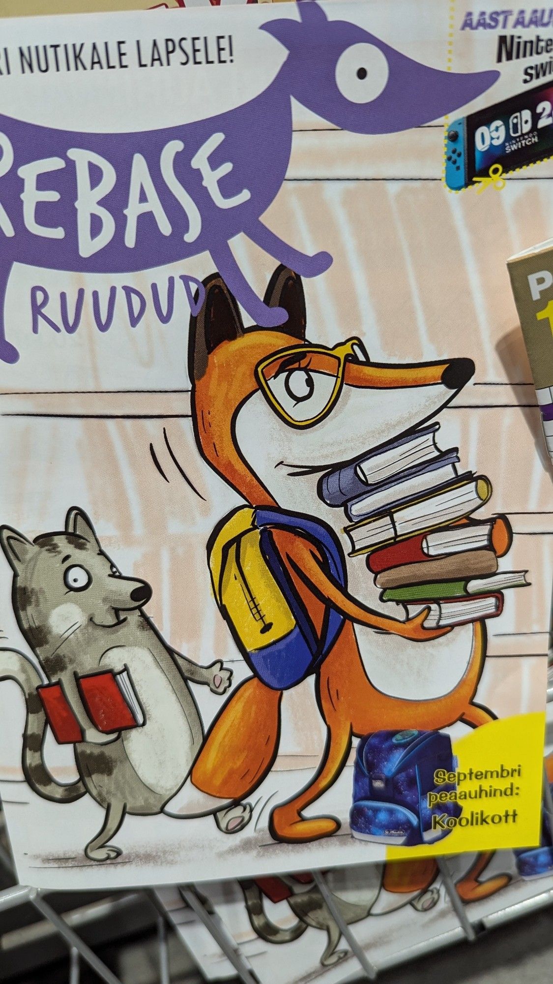 A fox carrying a stack of books from a magazine cover