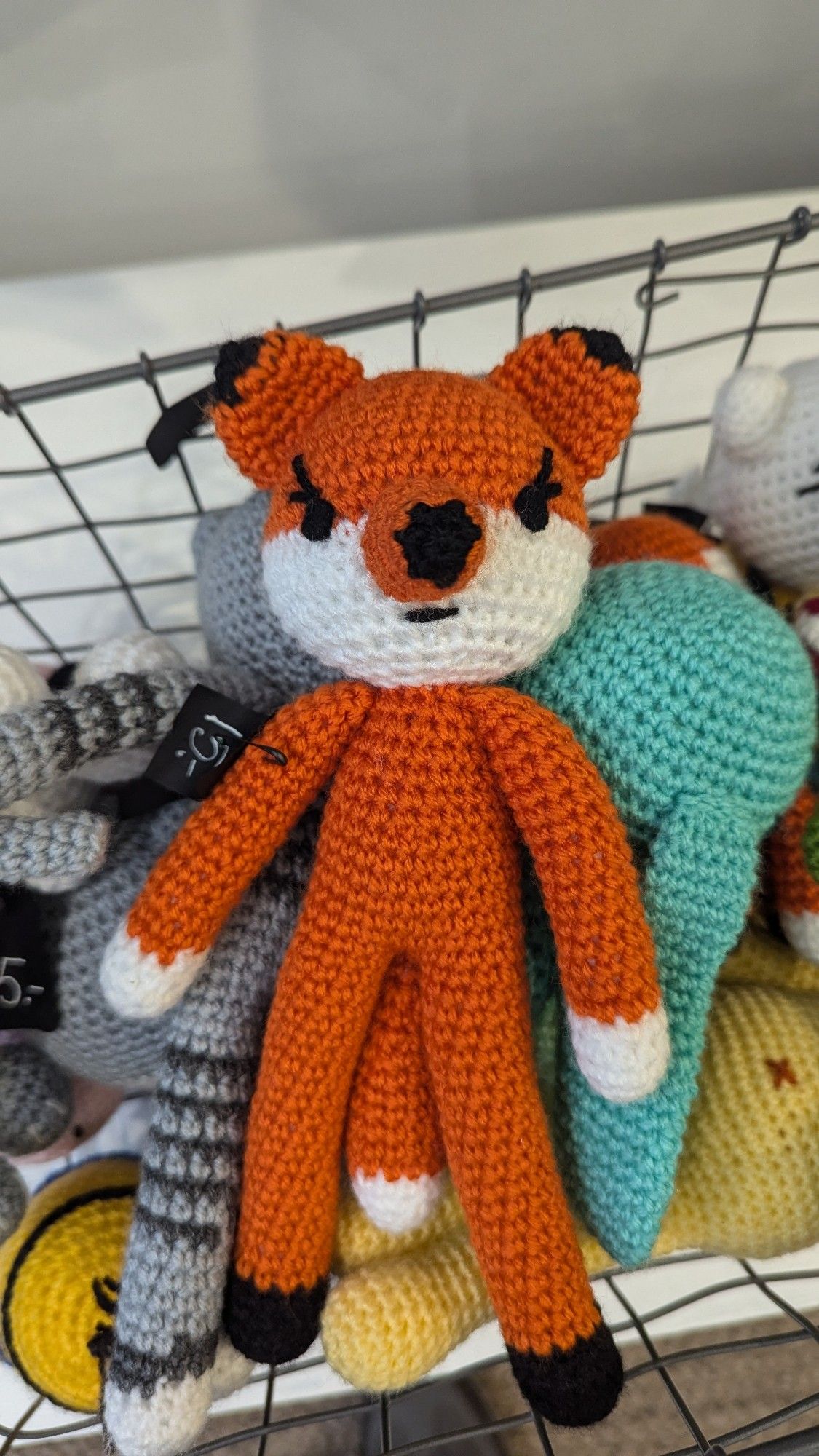 A crotchety crocheted fox in a store in Tartu