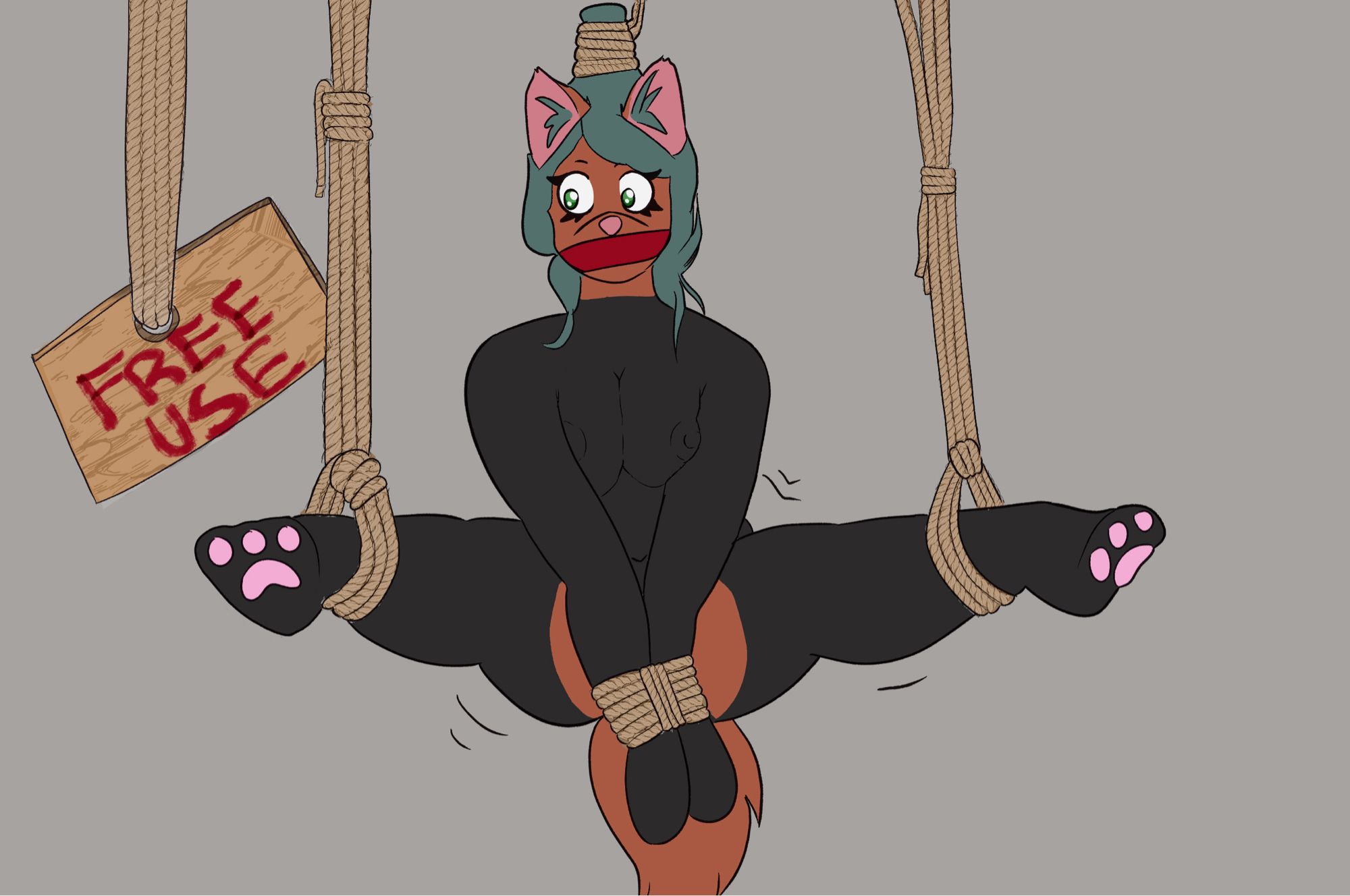 An anthro doggirl in a latex catsuit is hung using shibari rope with her legs open. A free use sign is next to her and she is gagged