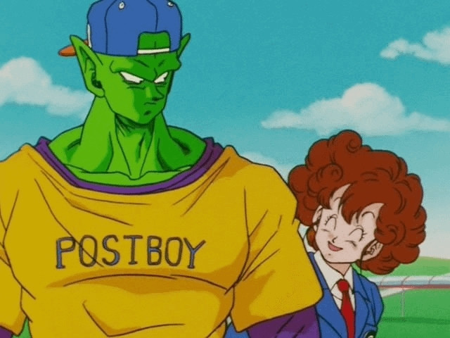 Piccolo wearing a yellow t-shirt saying POSTBOY with a purple undershirt and a blue backwards baseball cap 