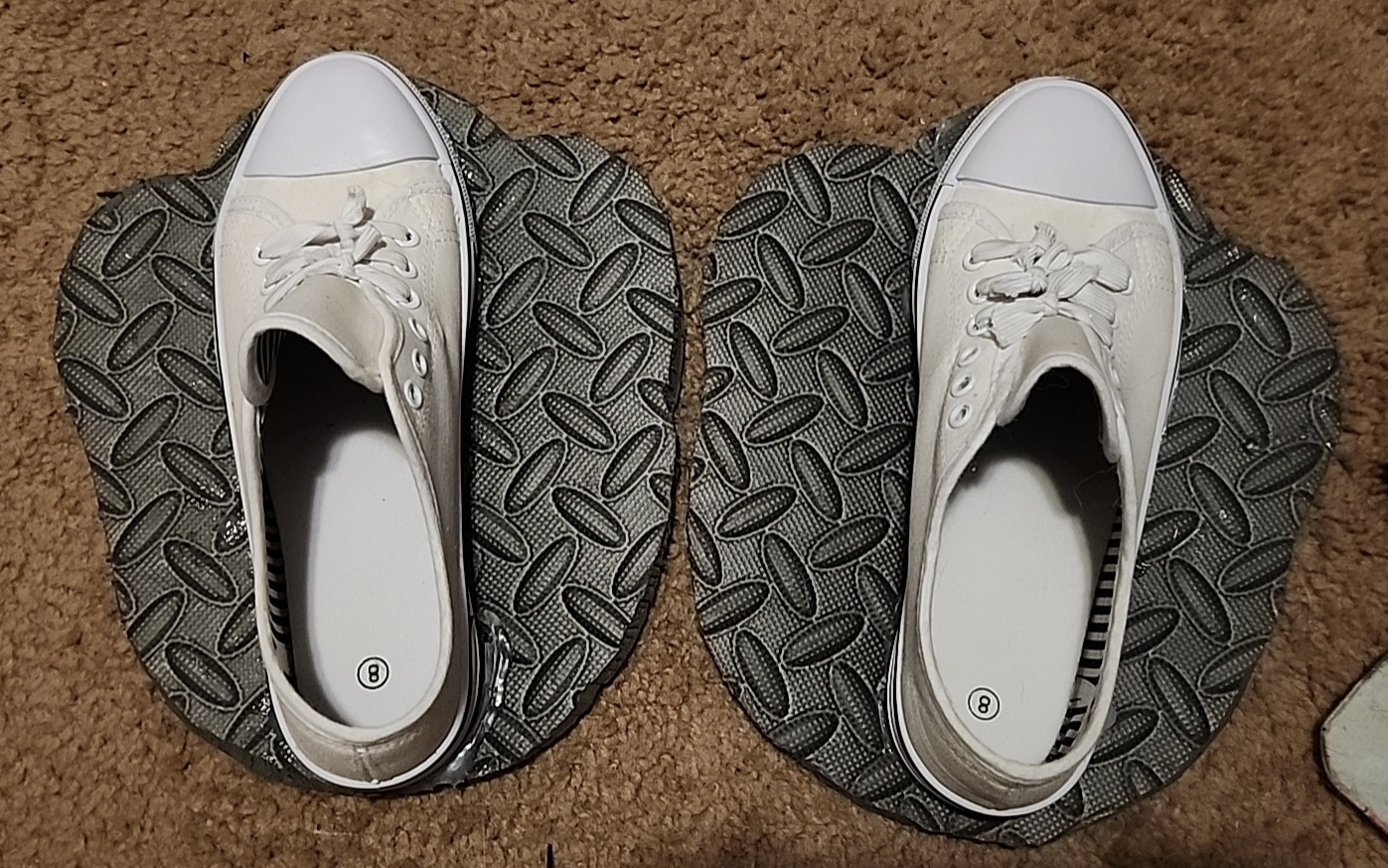 A pair of shoes glued to bases for feet paws for a fursuit