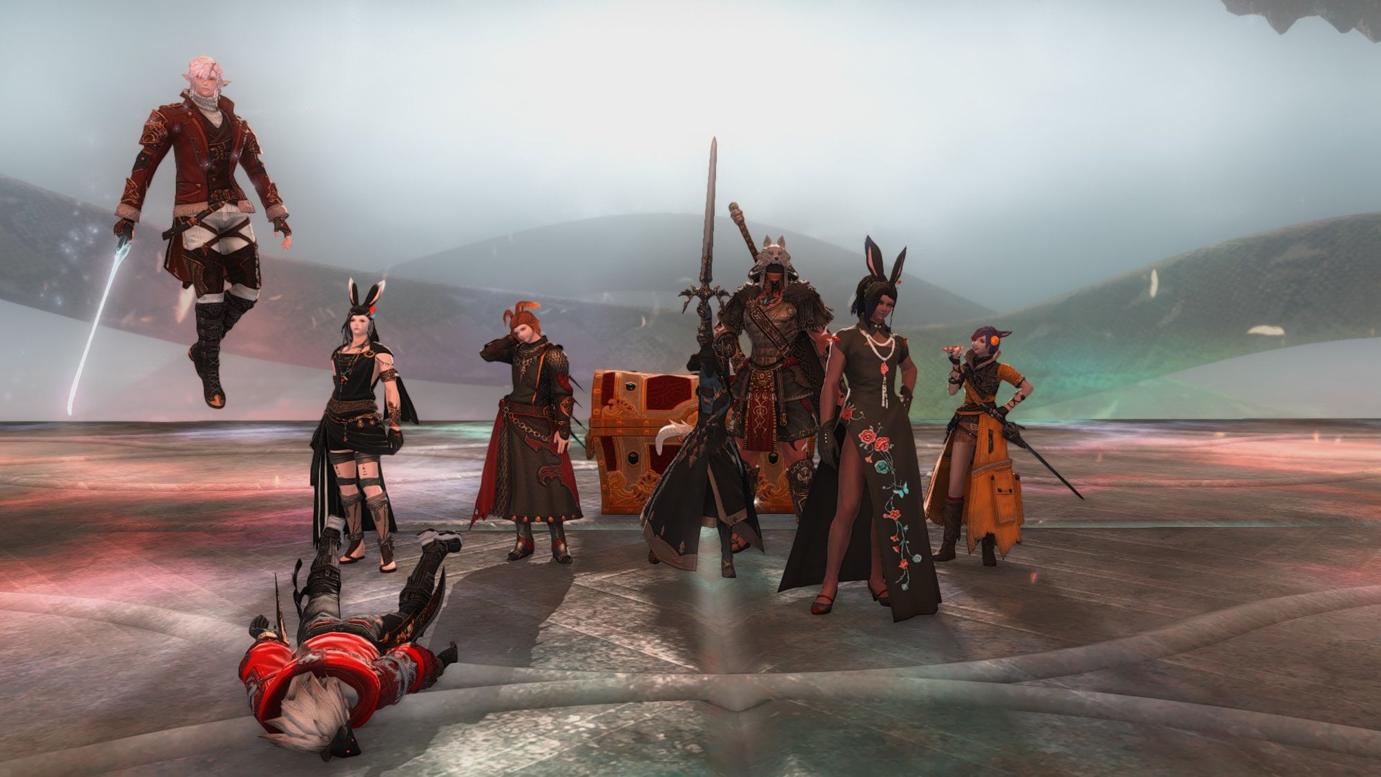 8 warriors of light pose victorious in front of a treasure coffer in the arena for P12S in Final Fantasy 14. There's a giant serpent in the background that's mostly obscured by fog