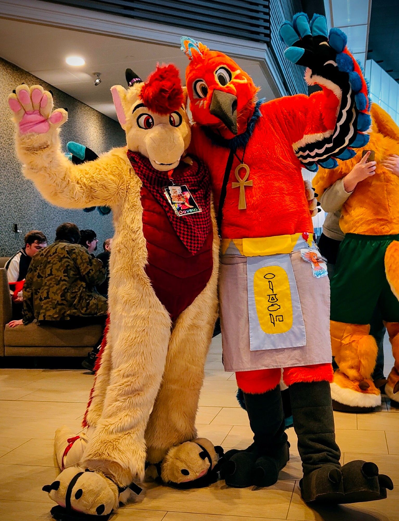 Cute fluffy fursuiters! Doveux and Regdeh are waving at the camera