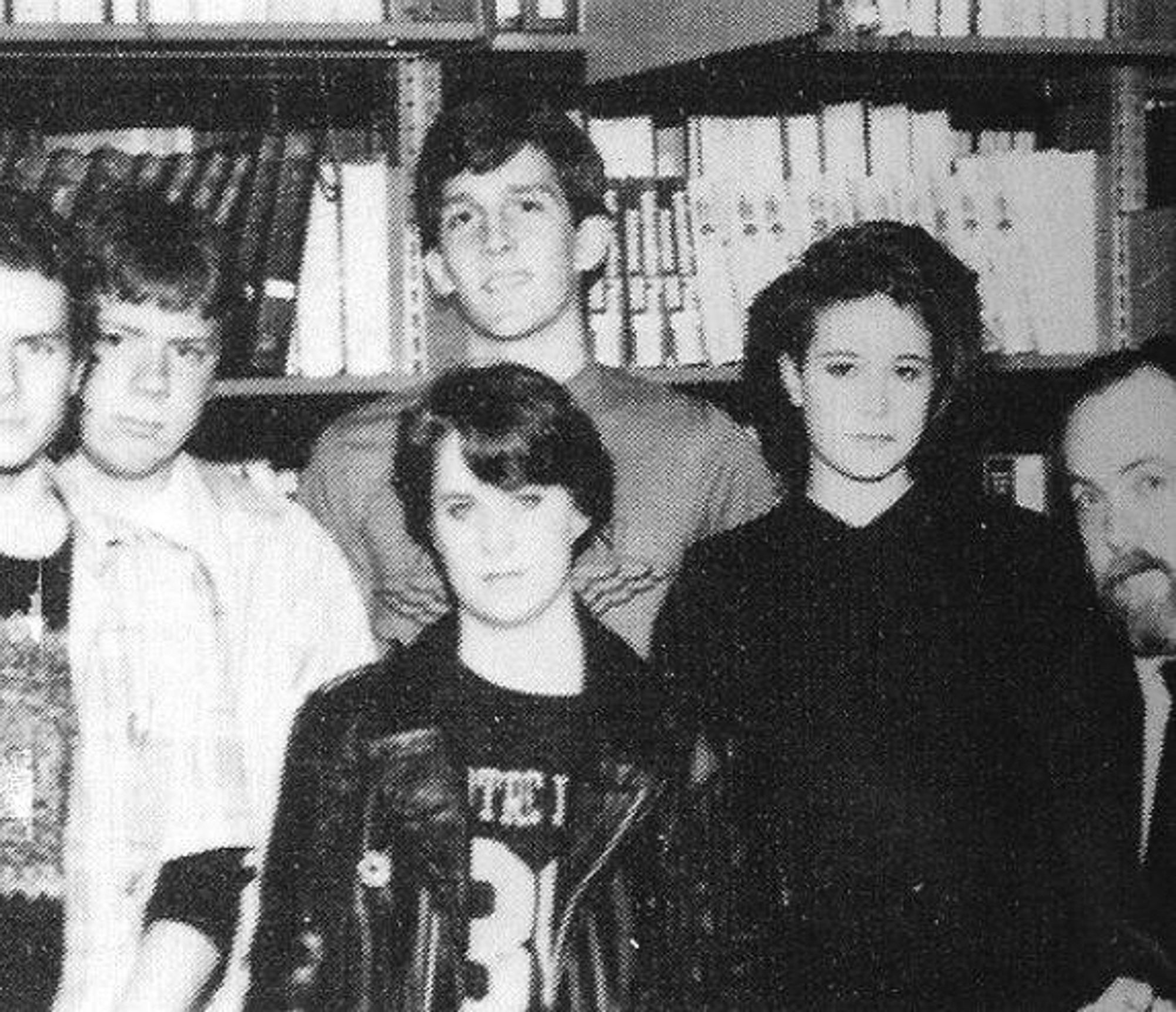 Angsty high schoolers from 1987 stare moodily into the camera. I am one of them.