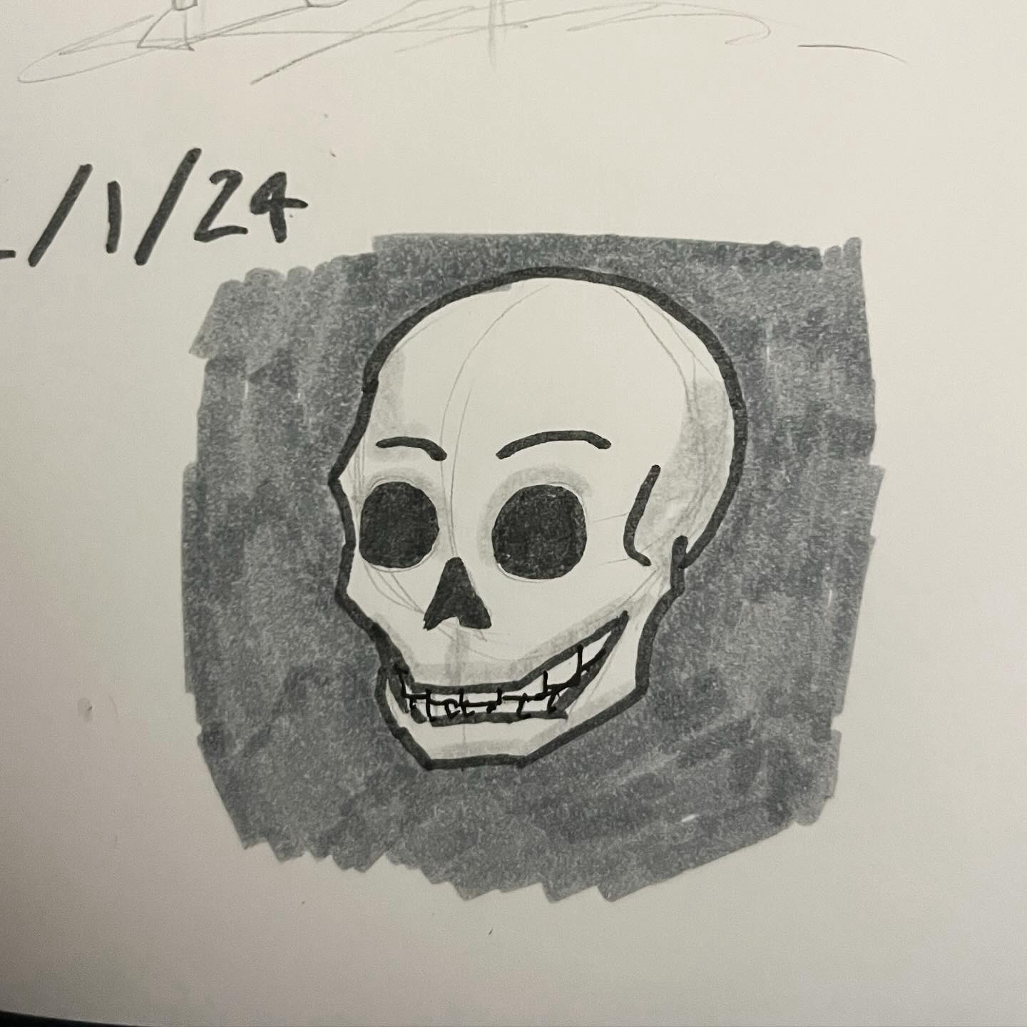 A pencil and marker drawing of a skull