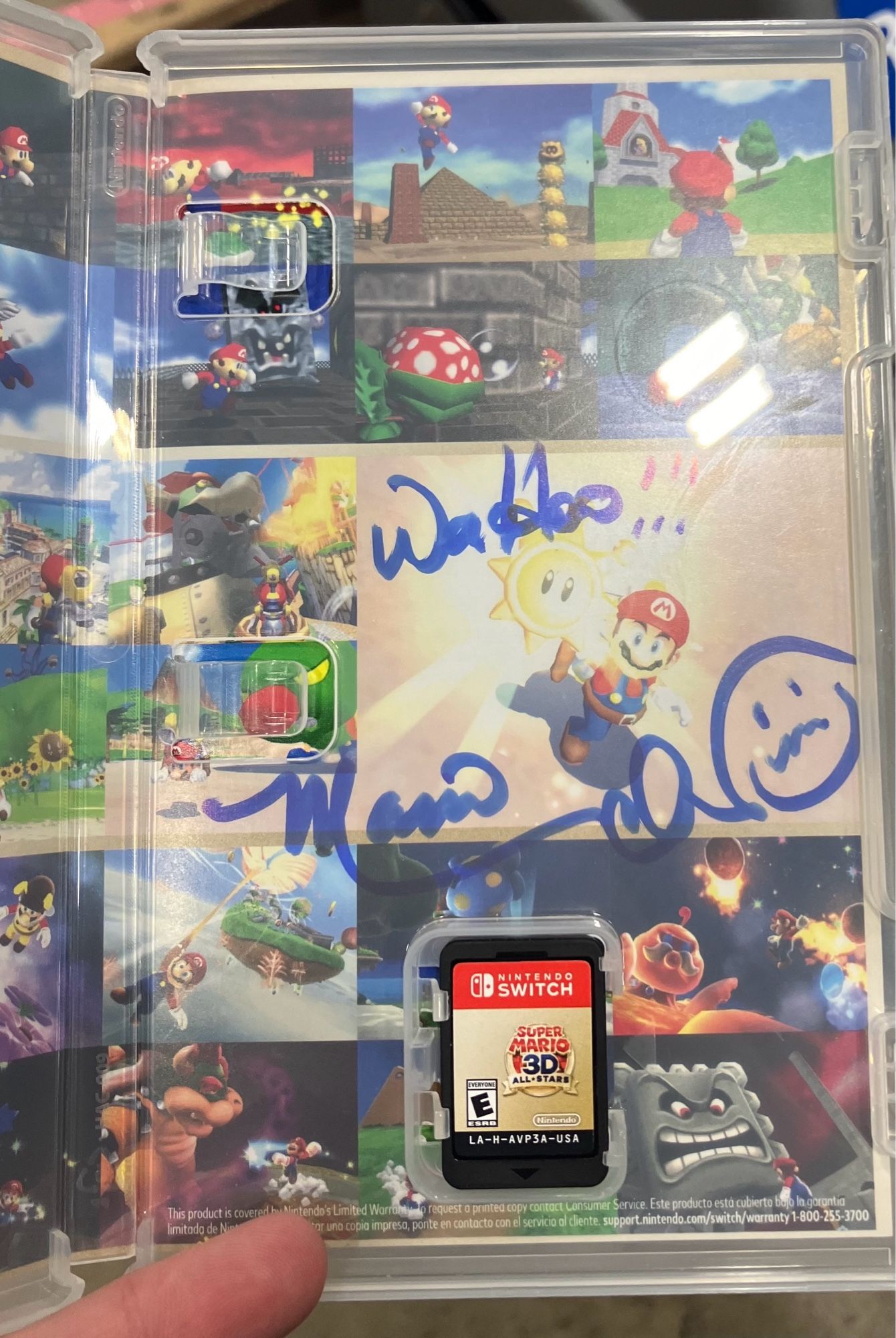 He signed the inside as well, adding a “WOO HOO!!!” next to Mario