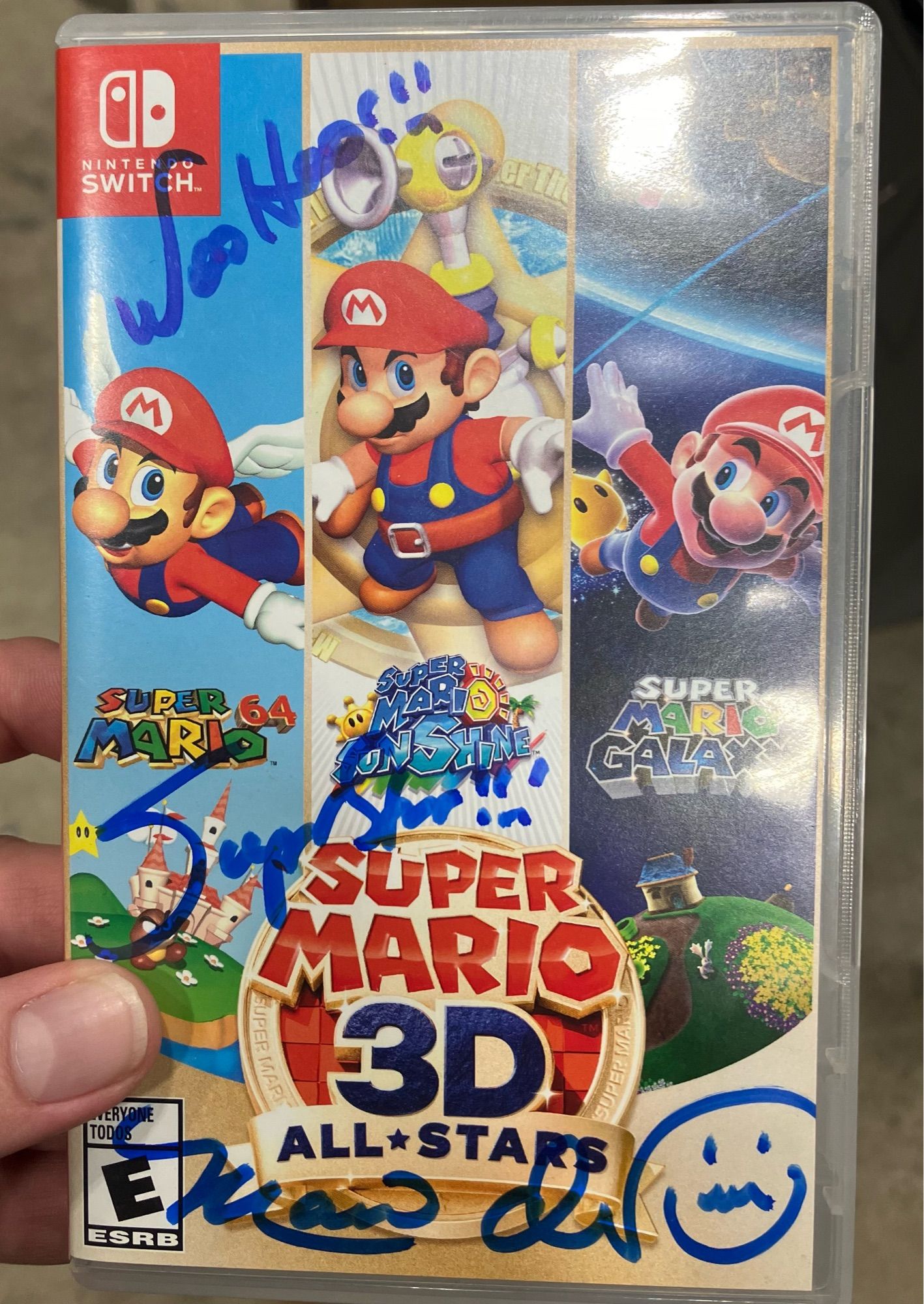 Super Mario 3D All Stars signed by Charles Marinet. He also wrote “WOO HOO!!!” And “SuperStar!!!” on the cover