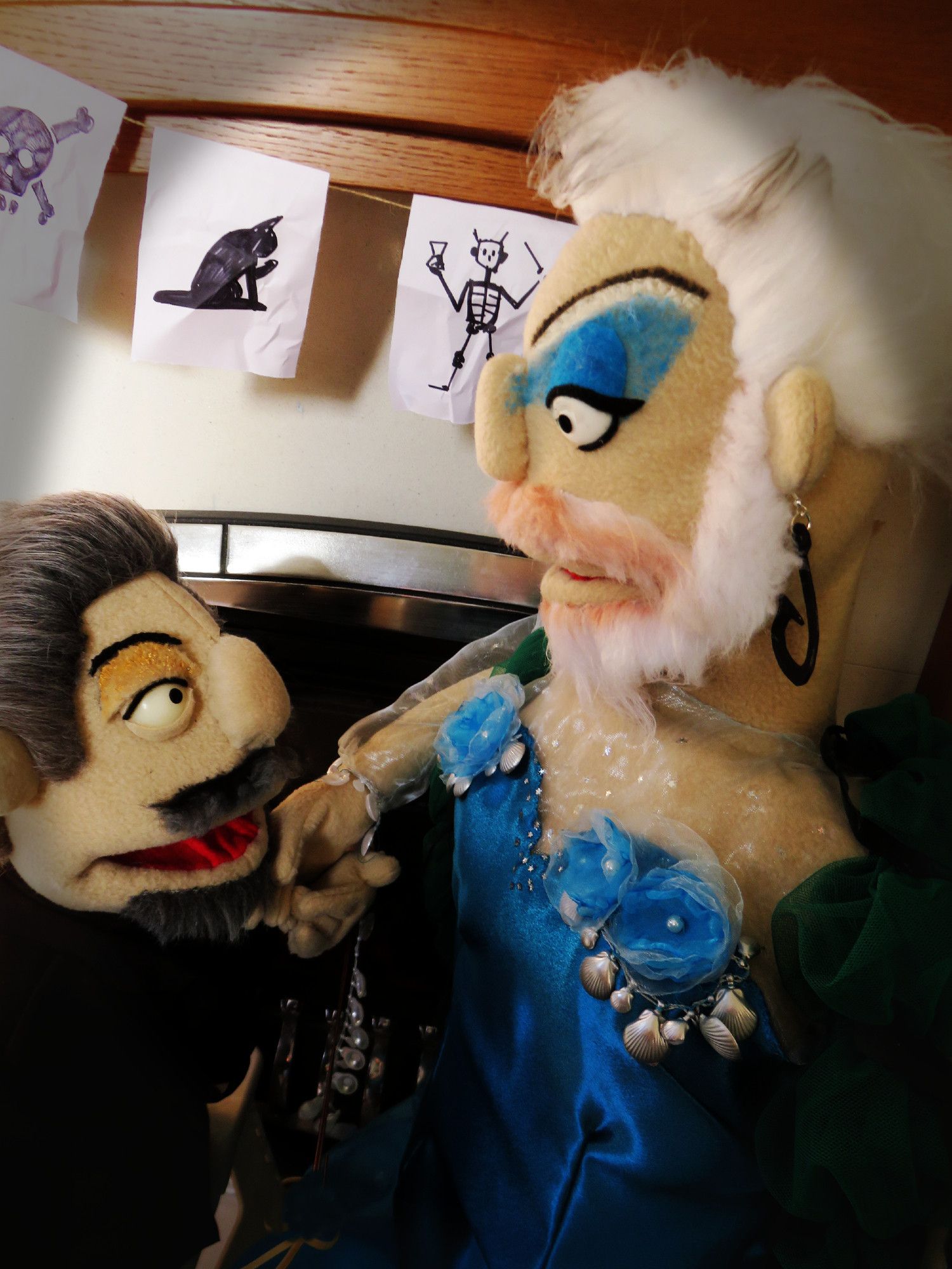 #2 Muppet Izzy kisses muppet Calypso's hand