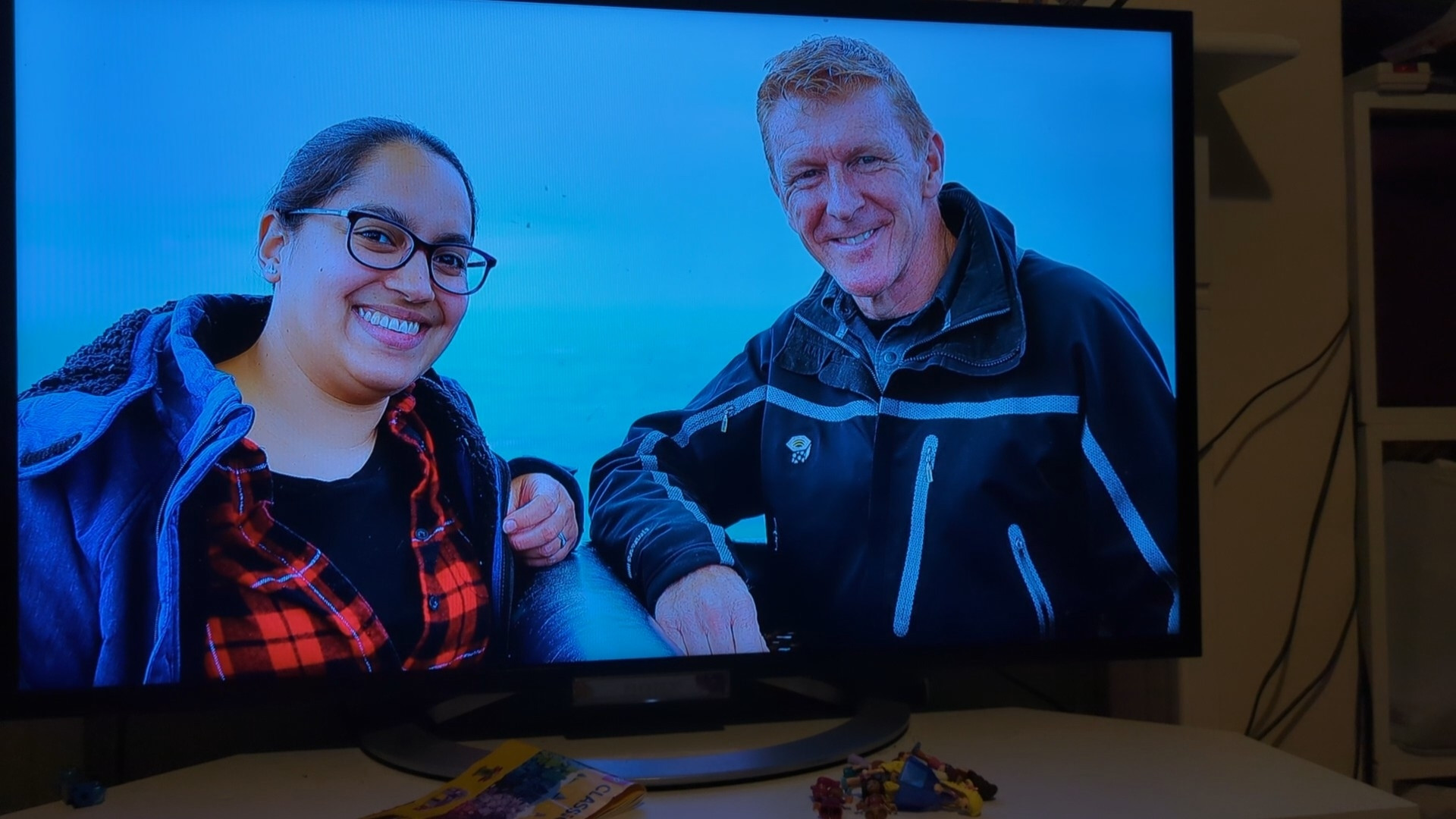 A photo of my TV with an image of me standing next to Tim Peake on it. We're both looking at the camera and smiling.