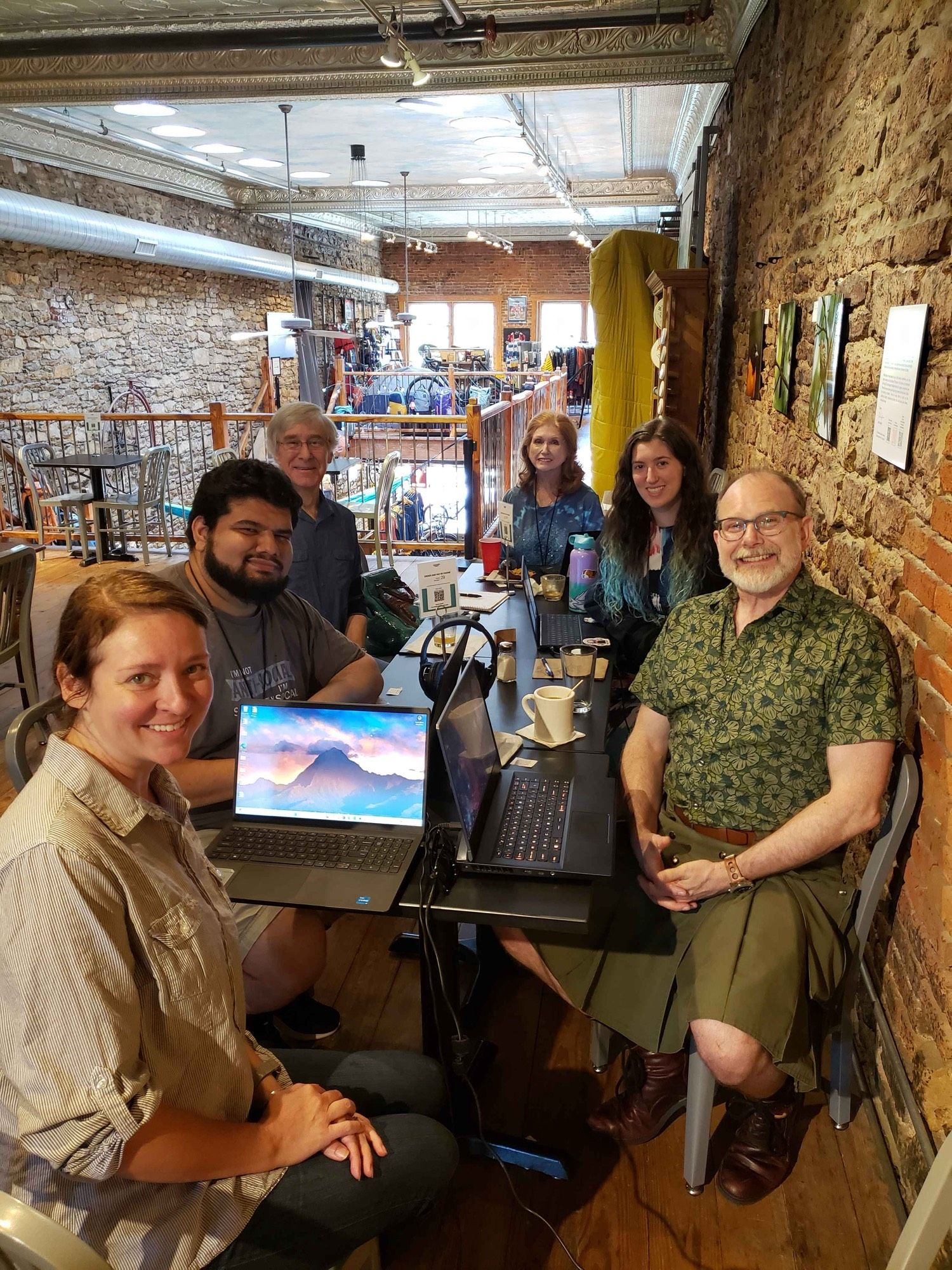 Ad Astra short story group at a coffee shop writing