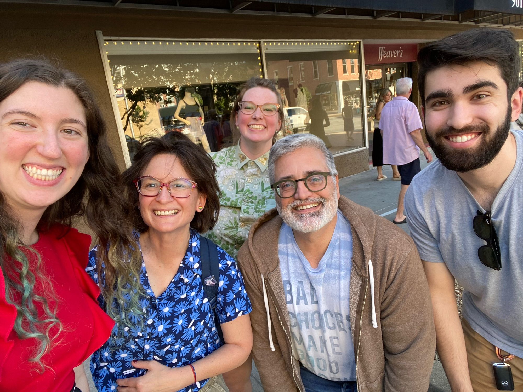 Group of writers smiling on the way to ice cream