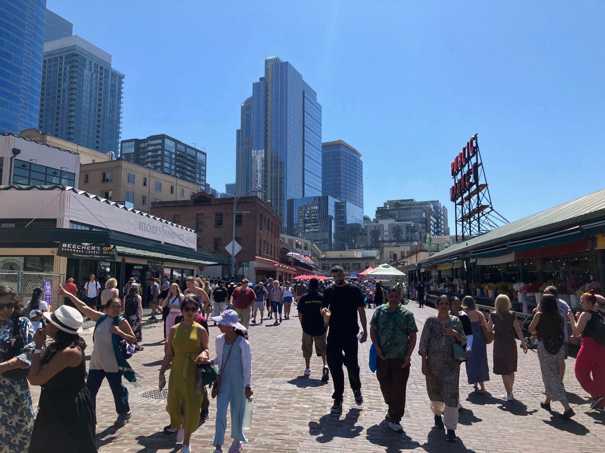 people walking and shopping in street