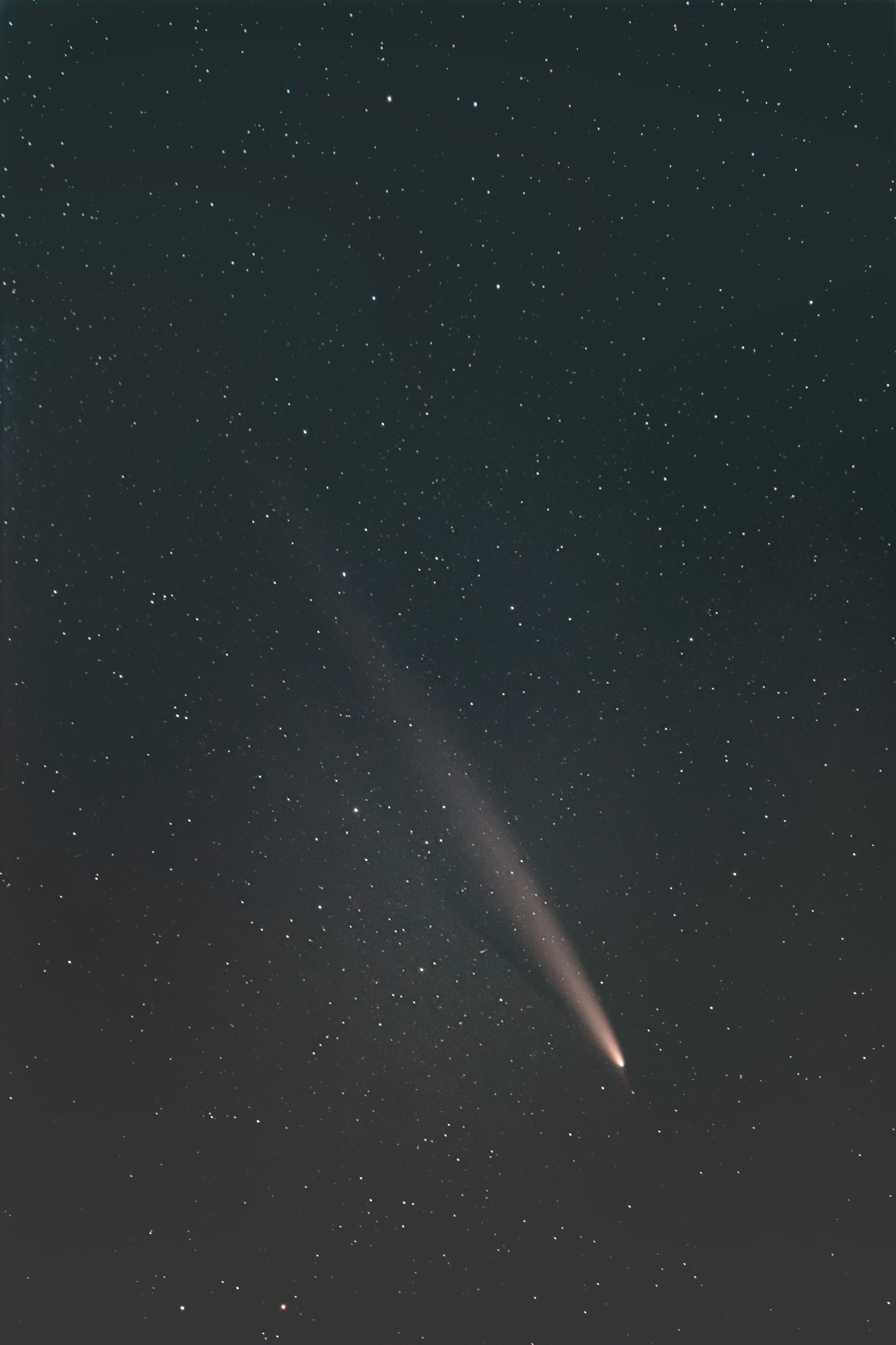 Comet C/2023 A3 (Tscuchinshan-ATLAS), a comet with a long orange tail