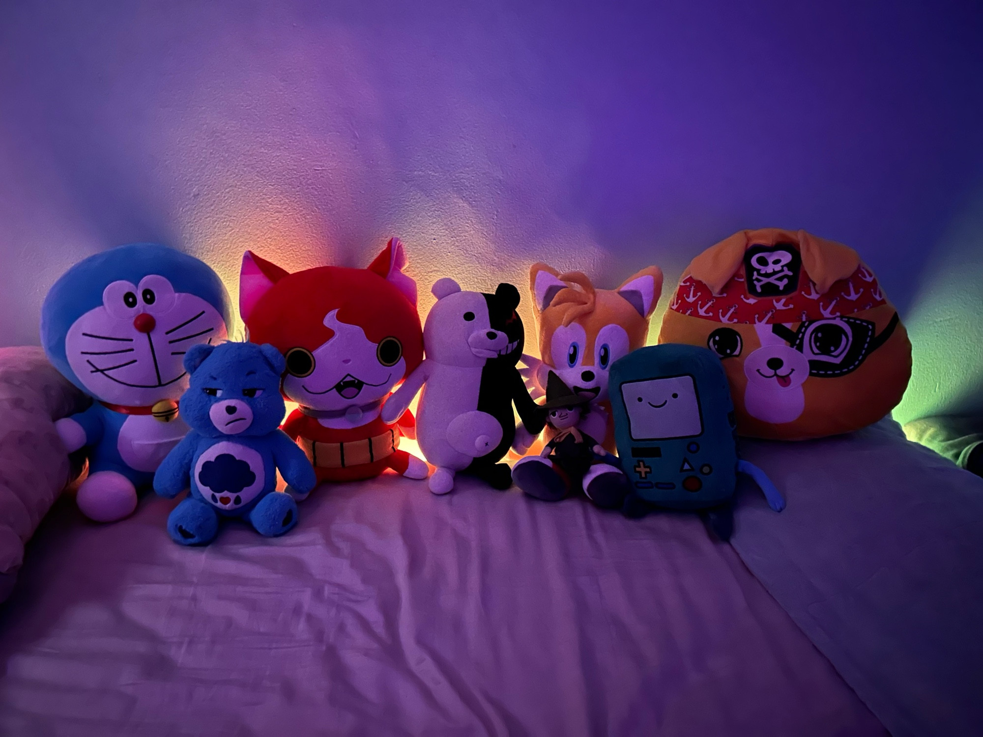 Left to Right: Doraemon, Grumpy Bear, Jibanyan, Monokuma, Tails, Snufkin, BMO, Bubba