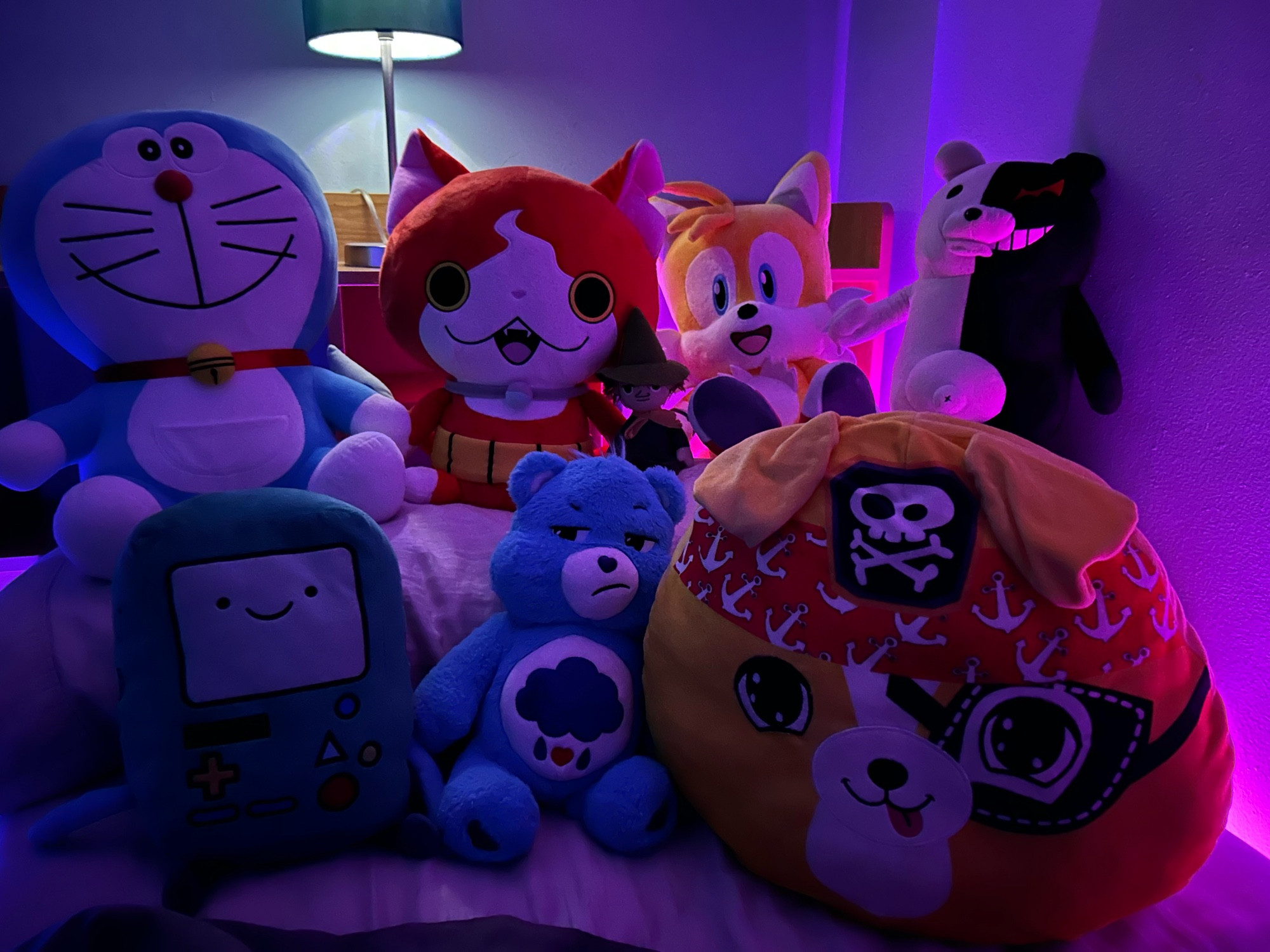 Left to right: Doraemon, BMO, Jibanyan, Grumpy Bear, Snufkin, Tails, Bubba, Monokuma