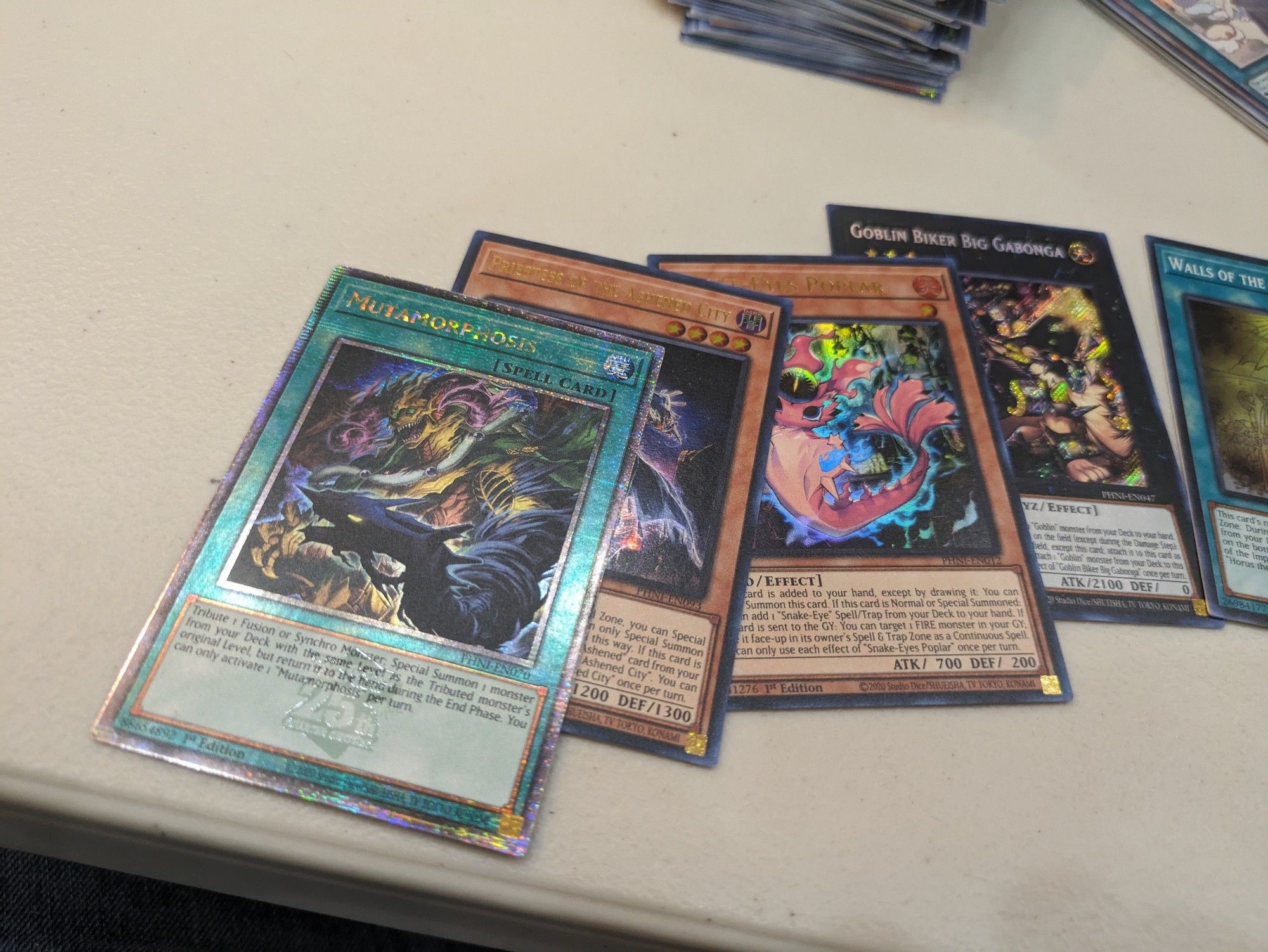 4 yugioh cards
QCSR mutamorphosis
Priestess of the ashened city
Snake eye poplar
Goblin biker big gobonga