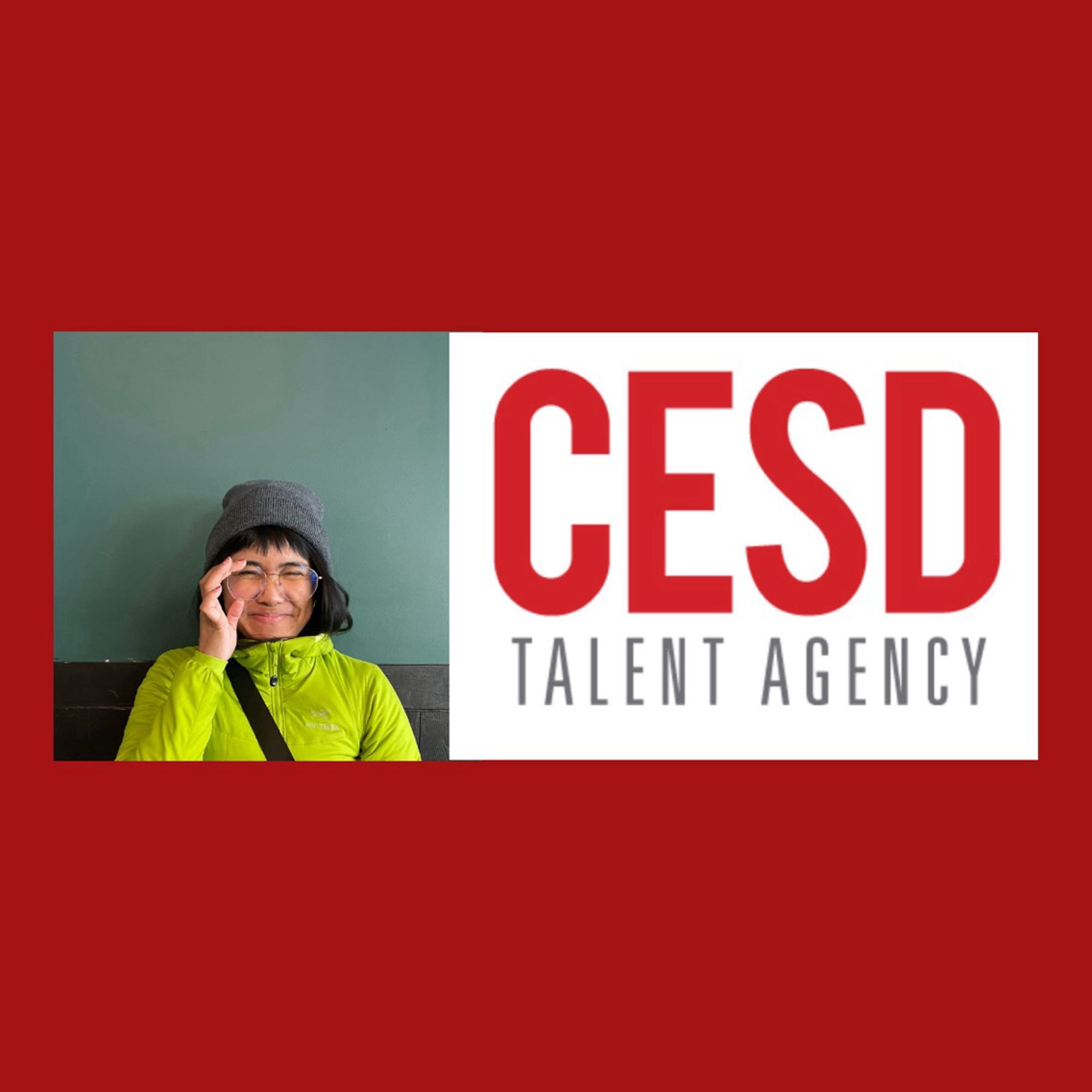 Red background with red text along white square saying CESD Talent Agency. Left of text is a photo of me wearing a bright green jacket, glasses, a grey beanie, against a color blocked wall of forest green and black wooden trim.