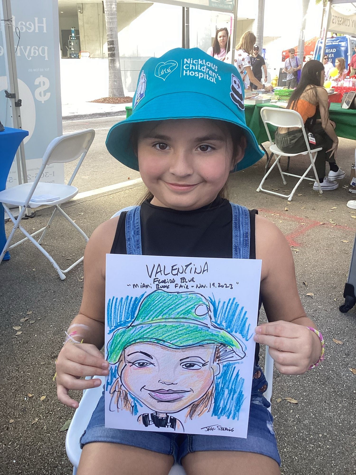 Miami Book Fair on the campus of Miami Dade College in downtown Miami, Florida organizers booked caricature drawings for entertainment by Miami Caricature Artist Jeff Sterling