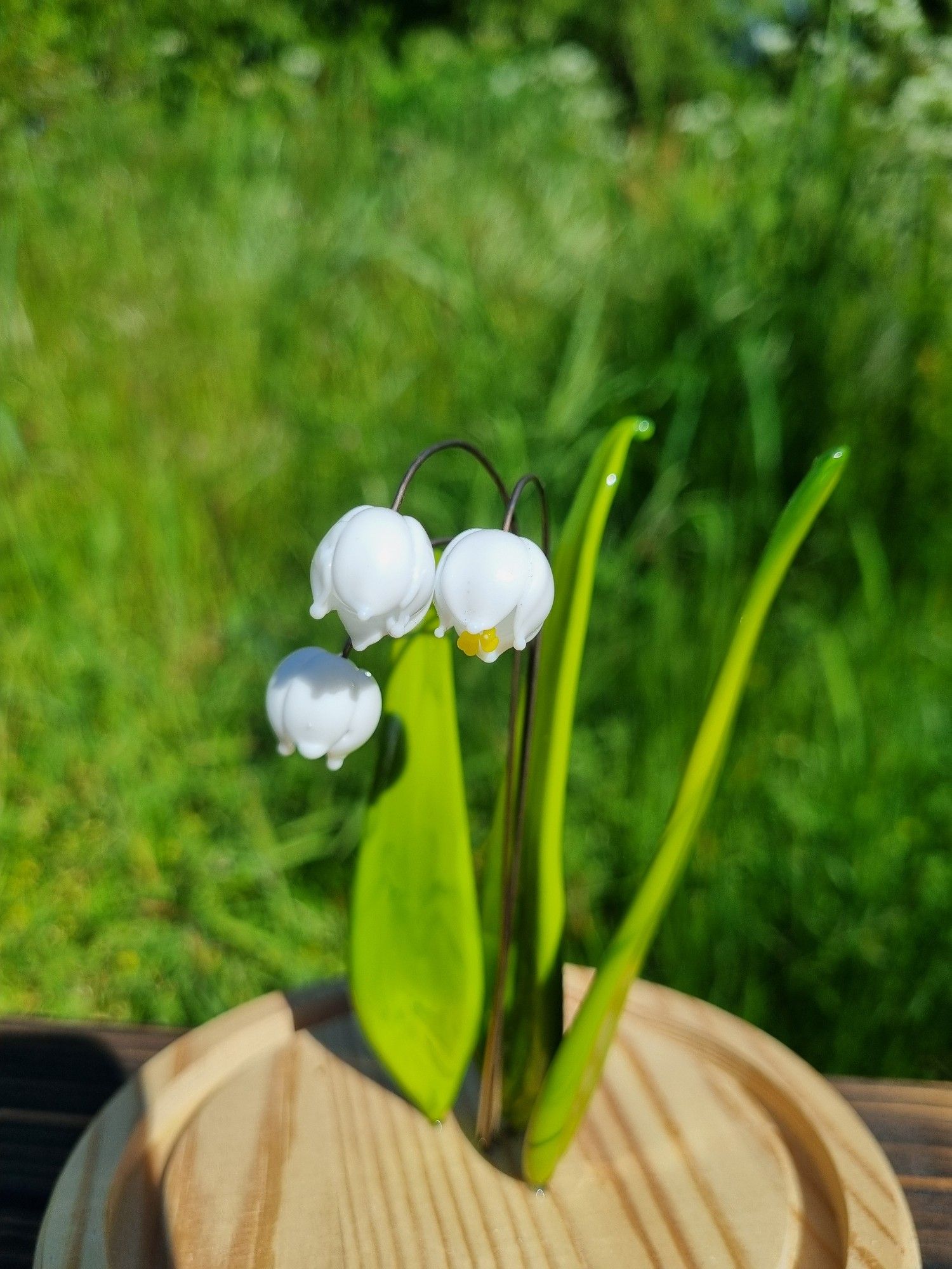 Brins de muguet en verre