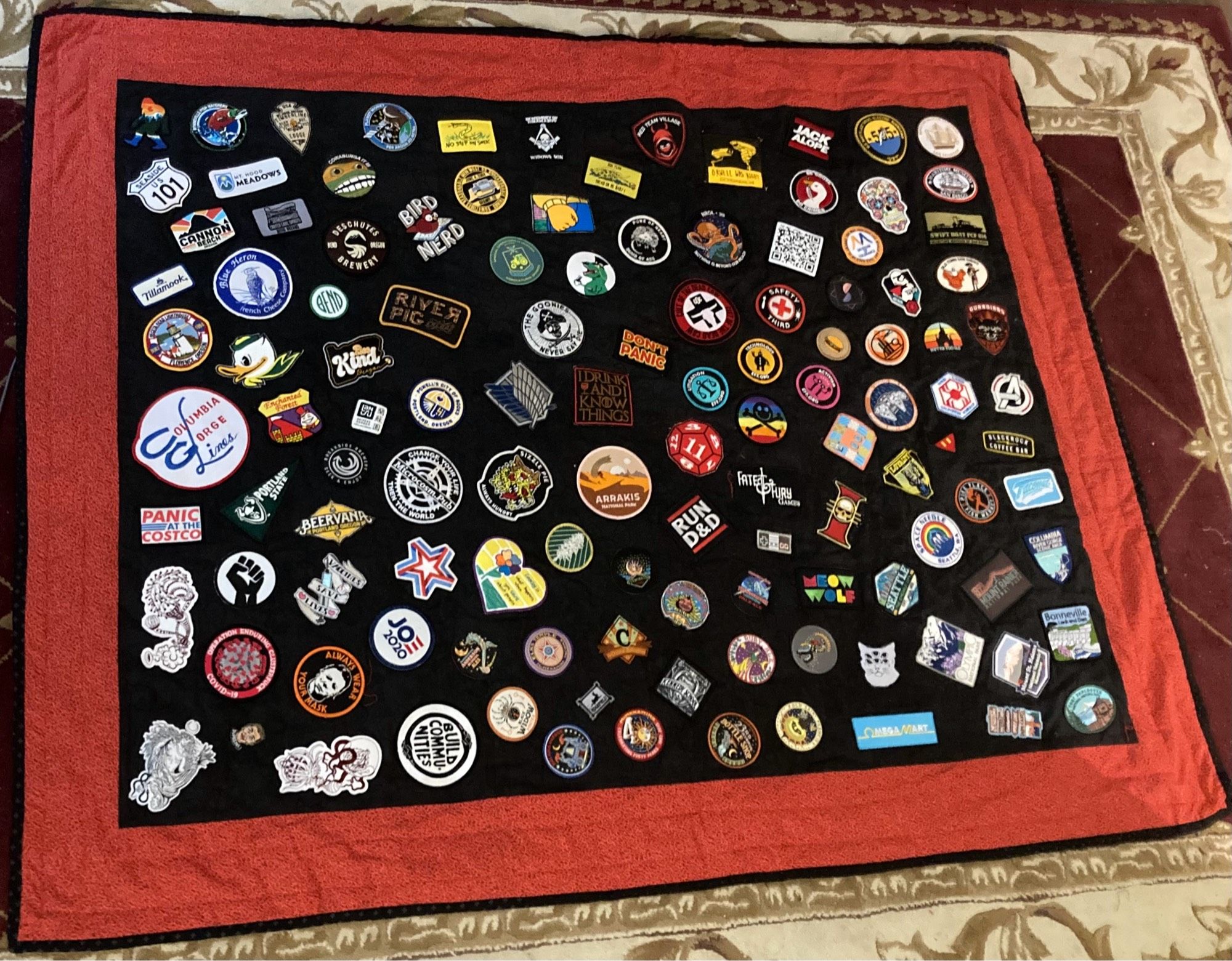 Picture of the whole lap quilt with over 100 patches in all