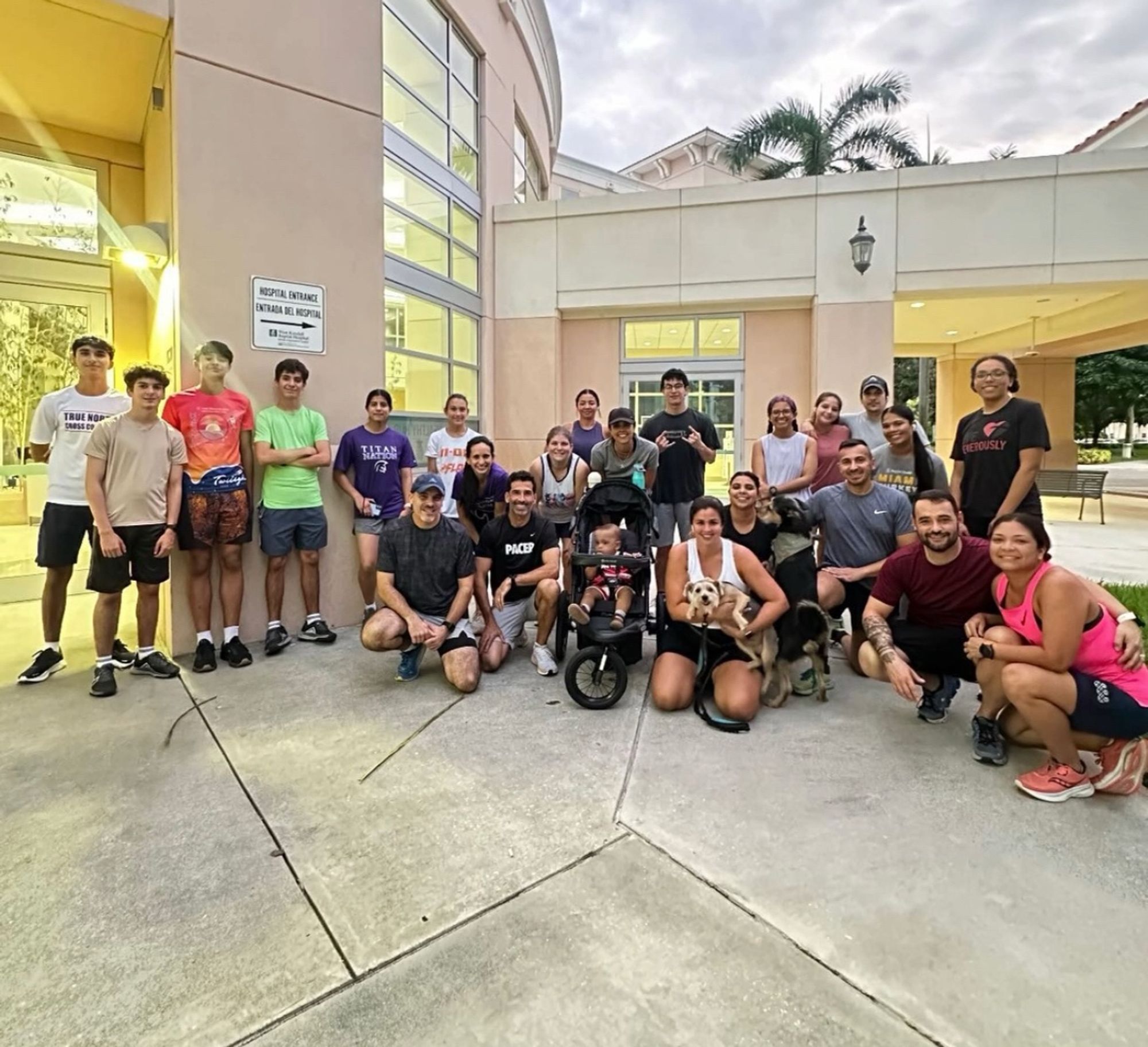 A large group of people in my run club last night, + 2 dogs!