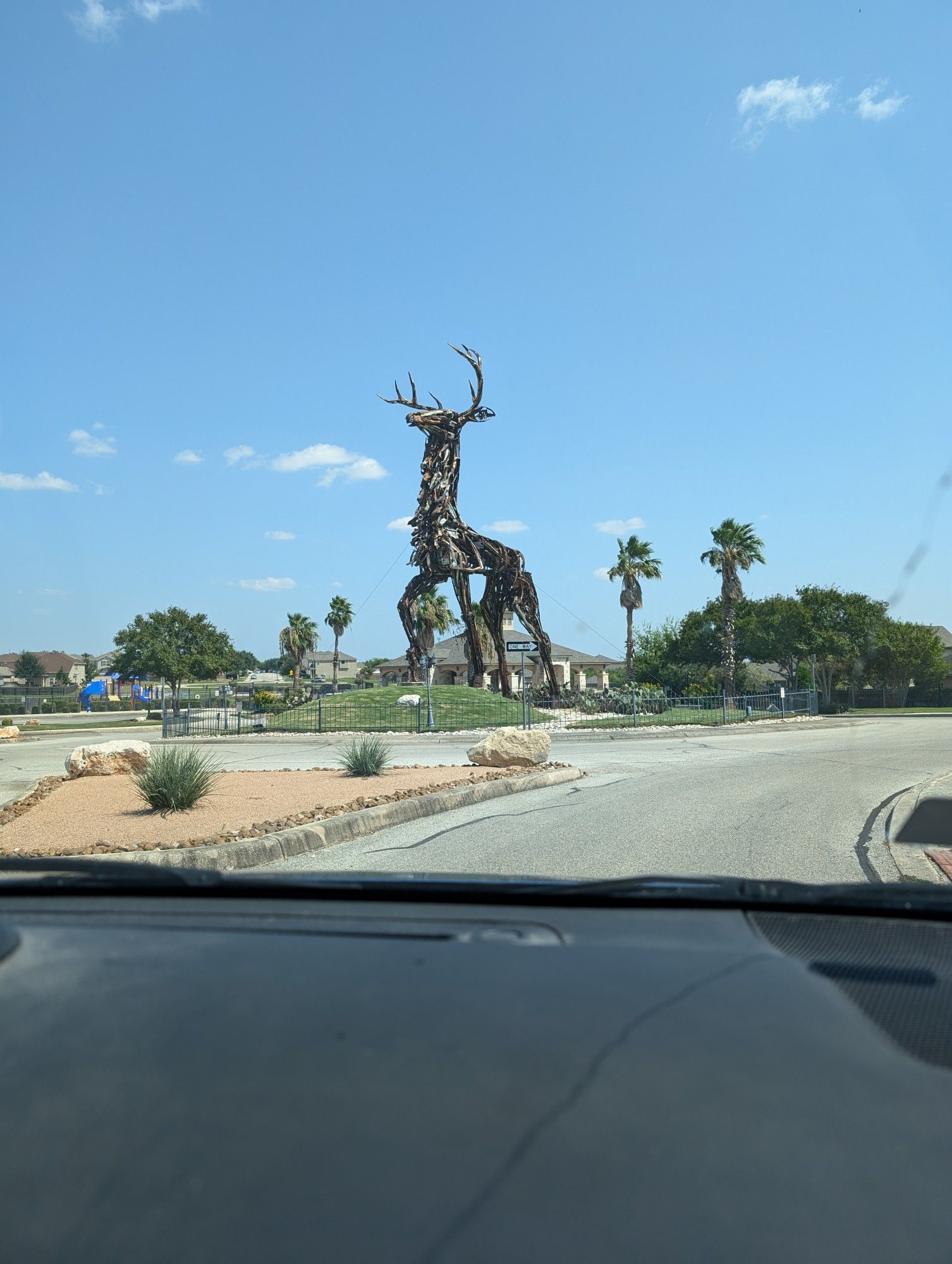 "King of the Parc" 40ft stag statue made of scrap metal and other assorted metal parts. Located in Converse, Texas