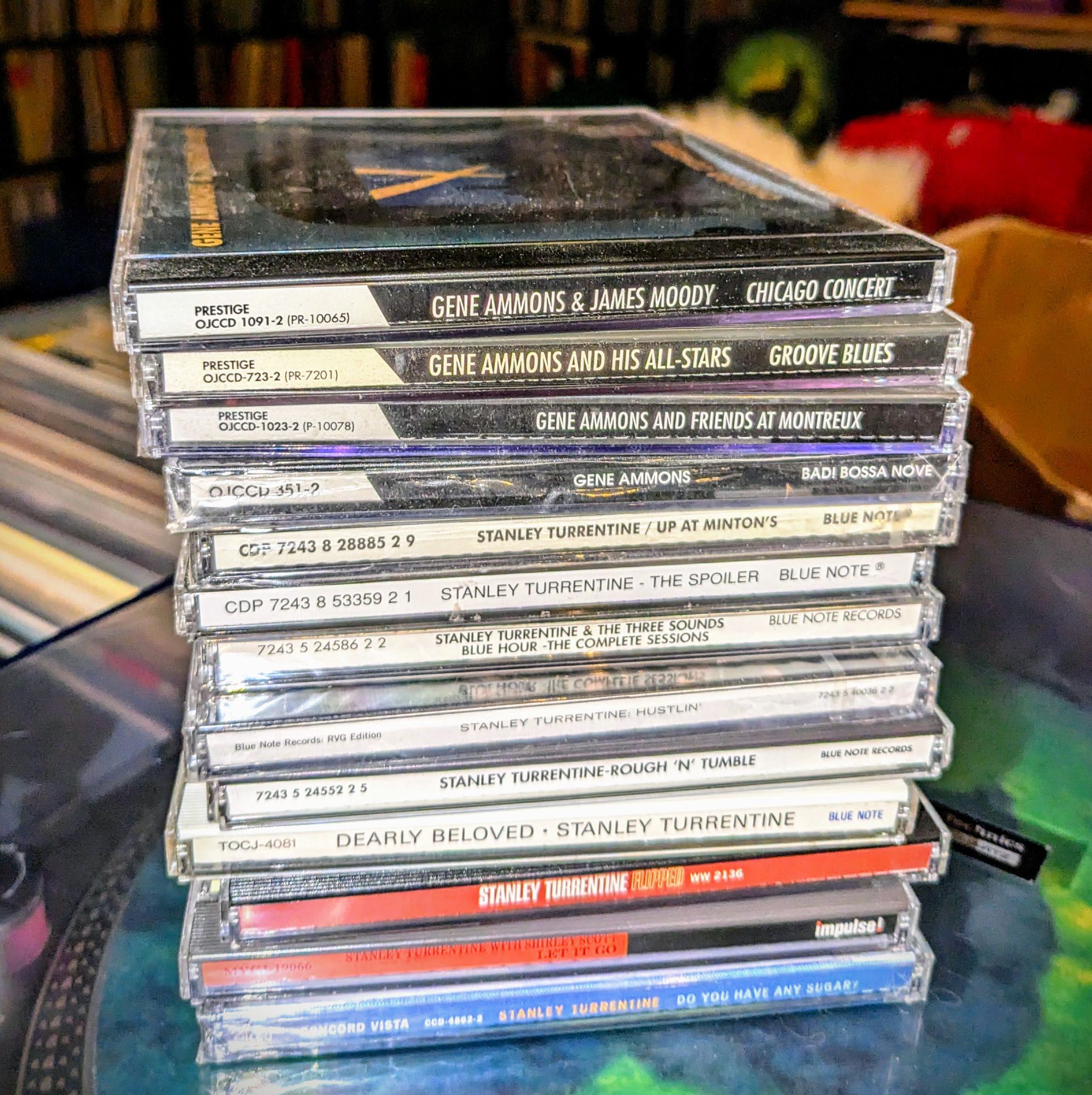 spine view of a cd pile of 4x Gene Ammons and 9x Stanley Turrentine.