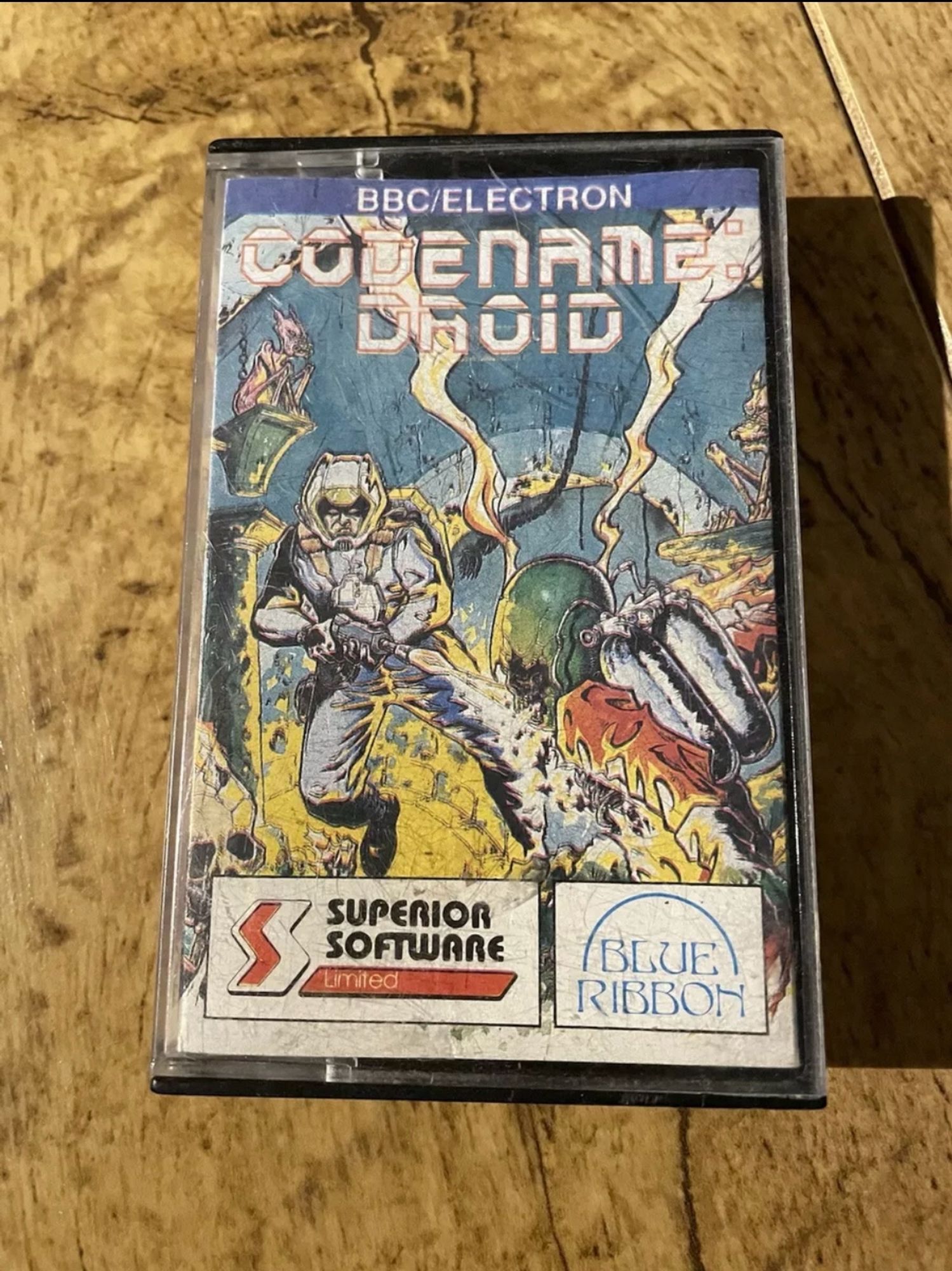 A budget cassette re-release of Codename Droid by Superior Software, on the Blue Ribbon label.