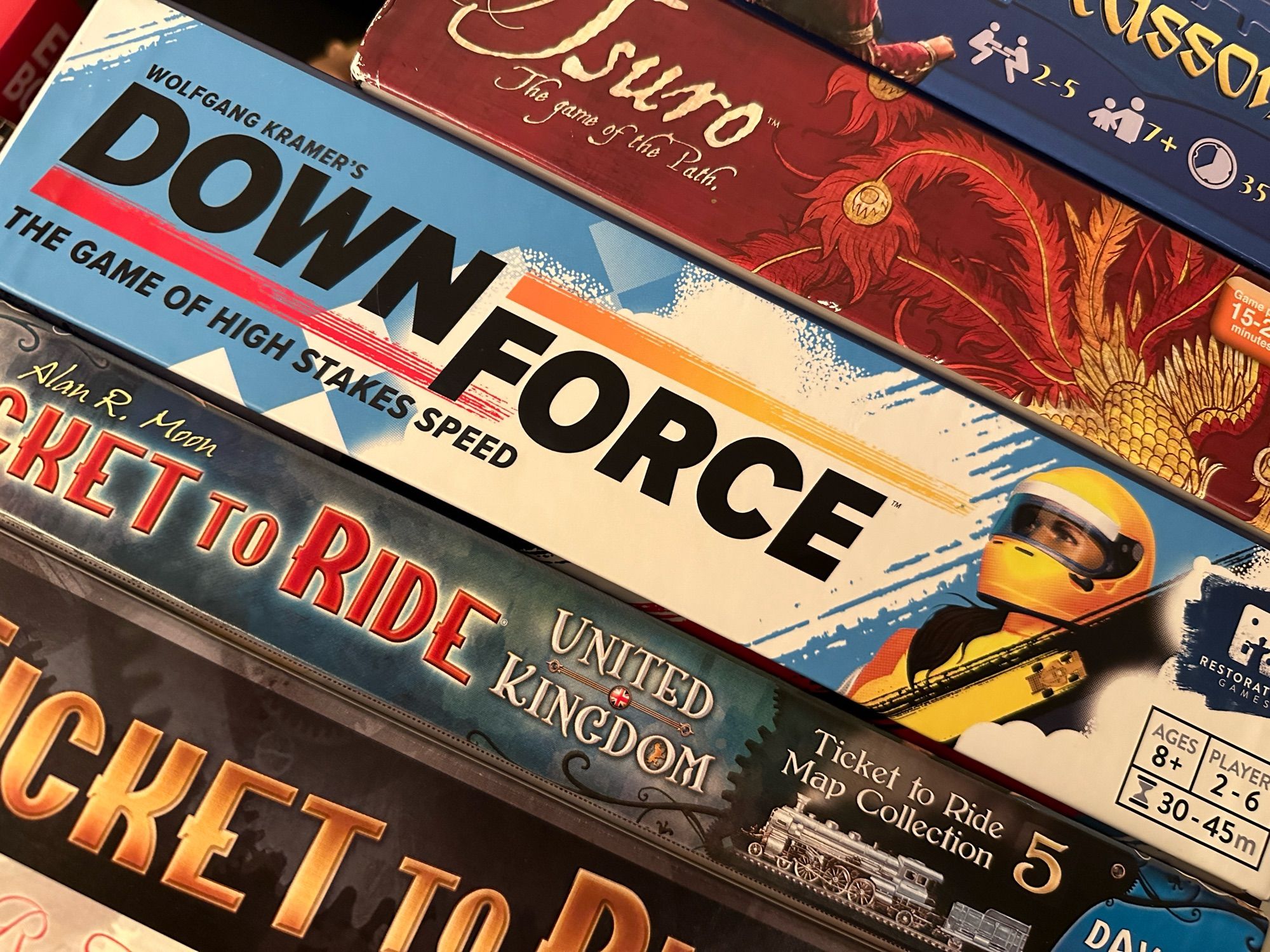 Stack of boardgame boxes