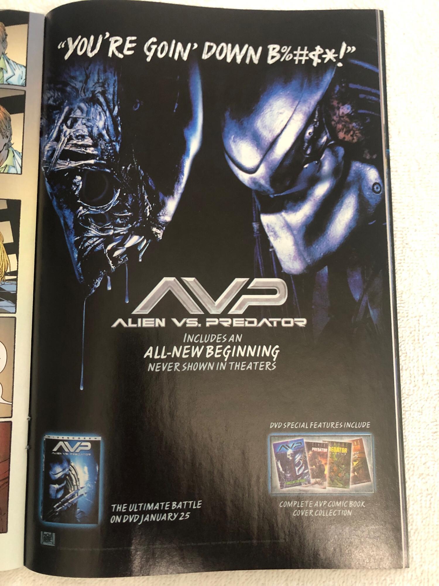 Ad in a comic for Alien Versus Predator movie DVD. Shows the Alien and Predator heads in profile, facing each other. Tag line is “You’re goin’ down B%#$*!”