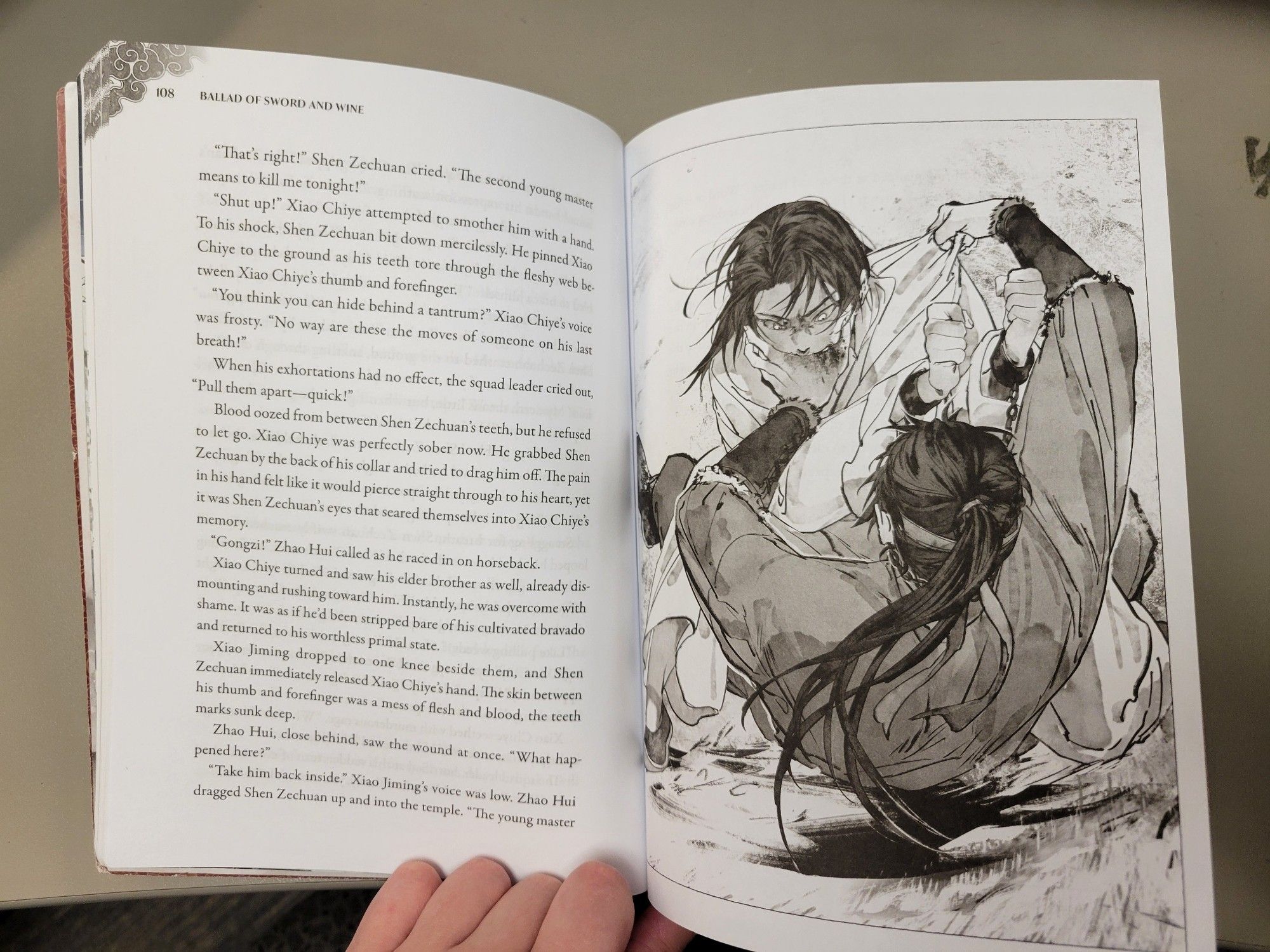 Chapter 10 of Ballad of Sword and Wine Volume

Left hand page: chapter text

Right hand page: Art where Shen Zechuan is pinning down Xiao Chiye and biting his palm.