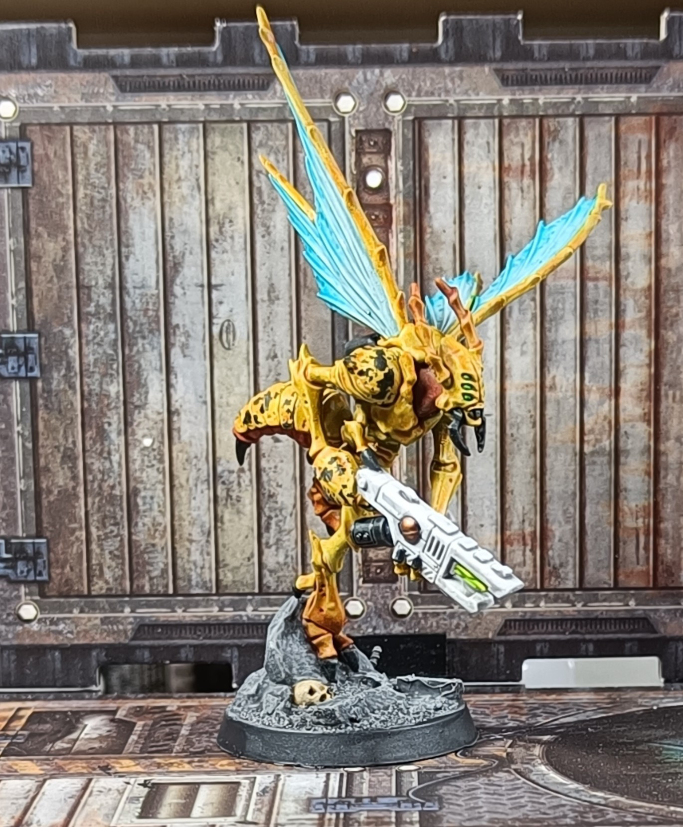 Picture of a model of a vespid painted yellow