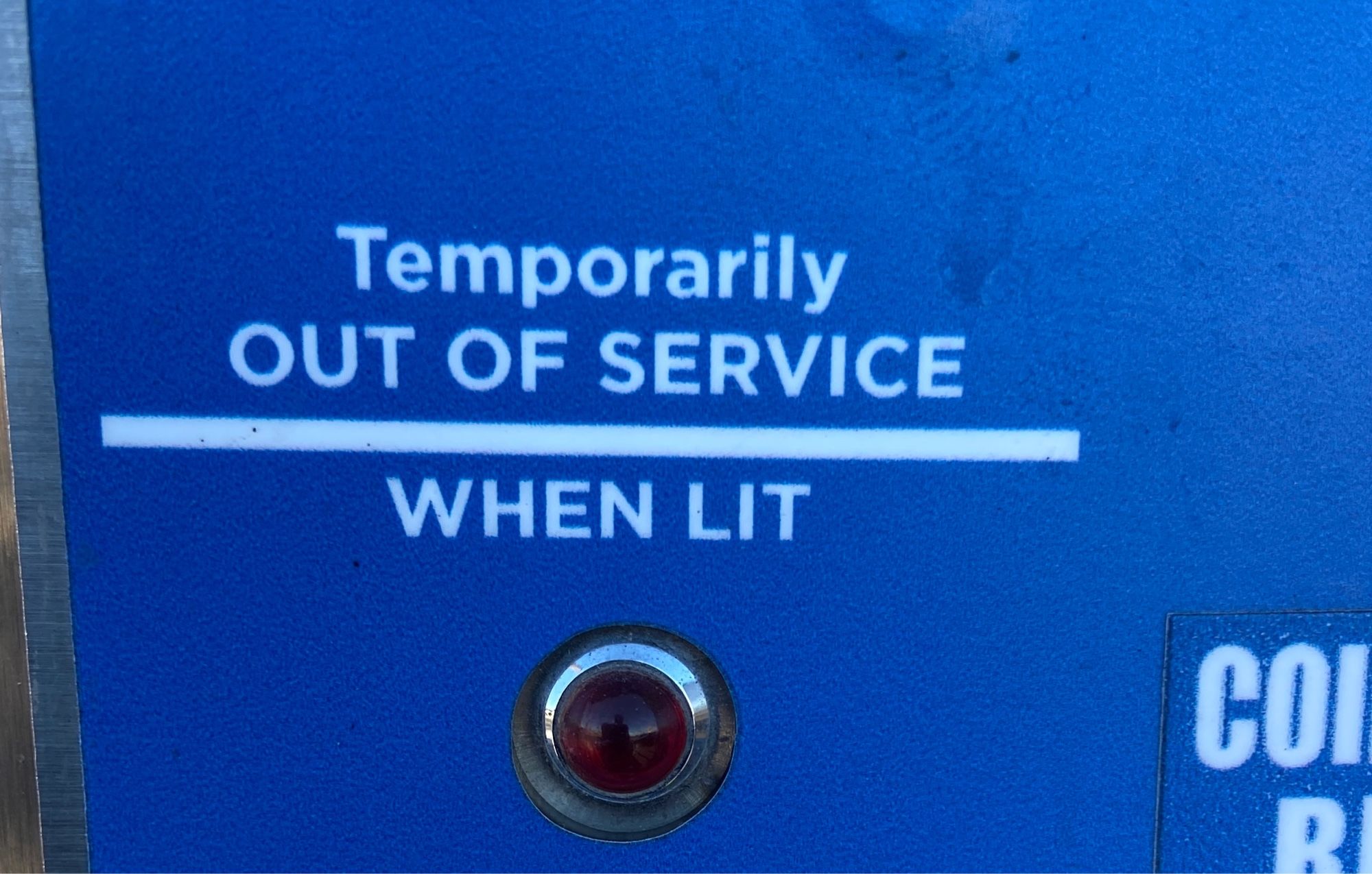 Vending machine that states “Temporarily out of service when lit ”