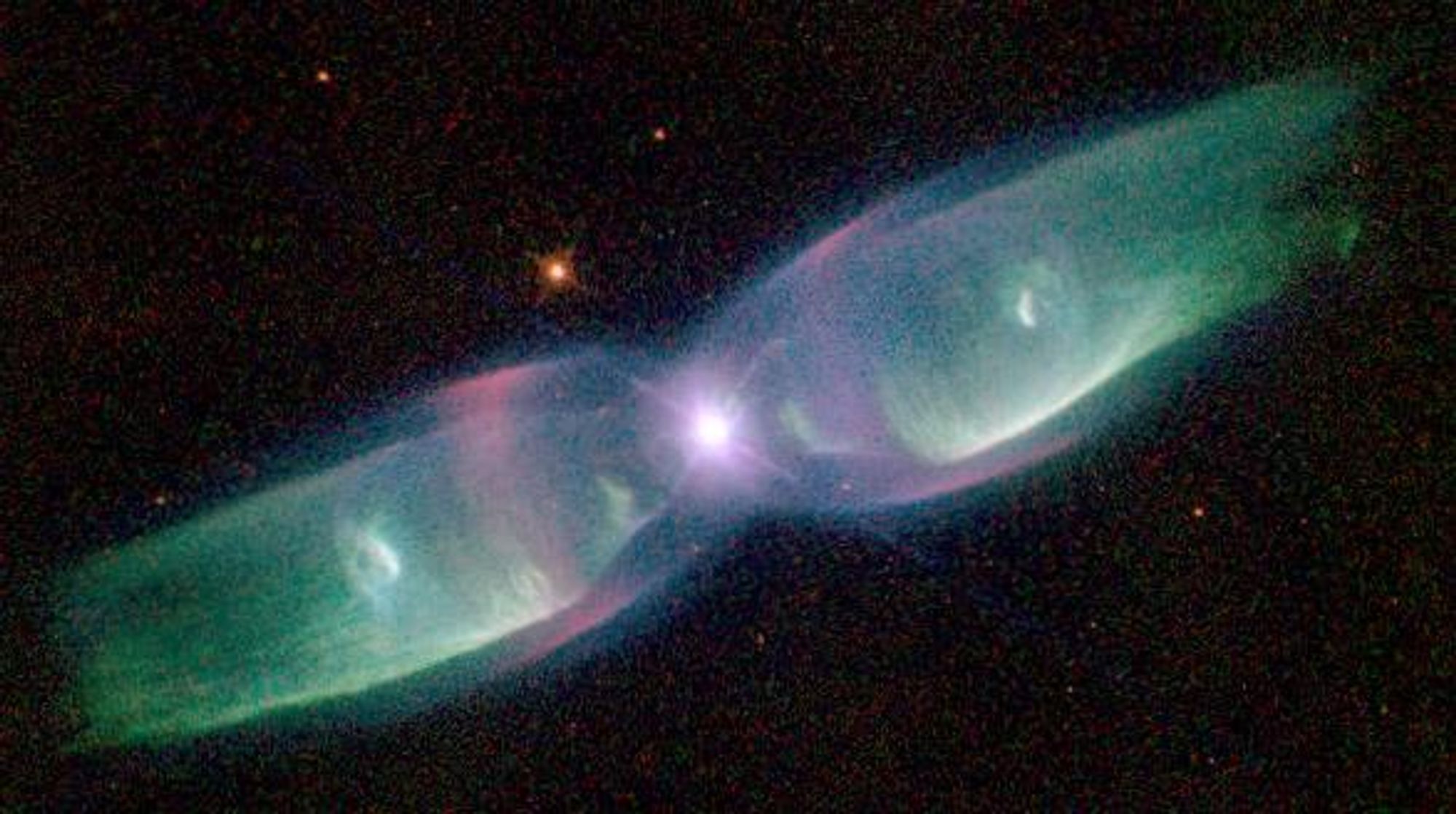 A colorful image of the butterfly planetary nebula M2-9. Two stars in the center orbit within a gaseous disk 10 times the orbit of Pluto.  The expanding gas from the dying star has broken out from the disk to create the bipolar appearance.  M2-9 is 2100 light-years away.