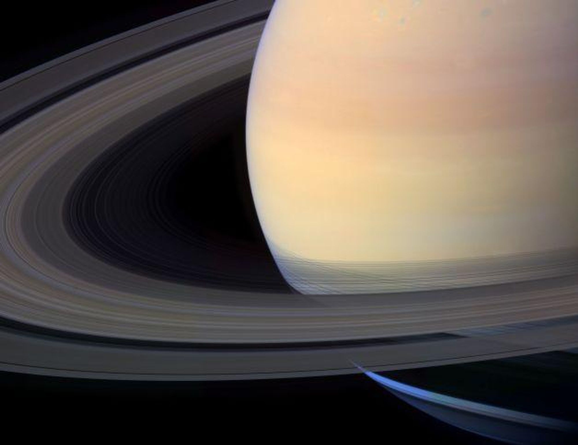 A stunning close-up image of Saturn's rings, captured by the Cassini spacecraft in 2004. The image shows the intricate details of the rings, including their numerous bands and the planet's surface. This high-resolution image is a composite of 102 individual frames taken by the Cassini spacecraft.