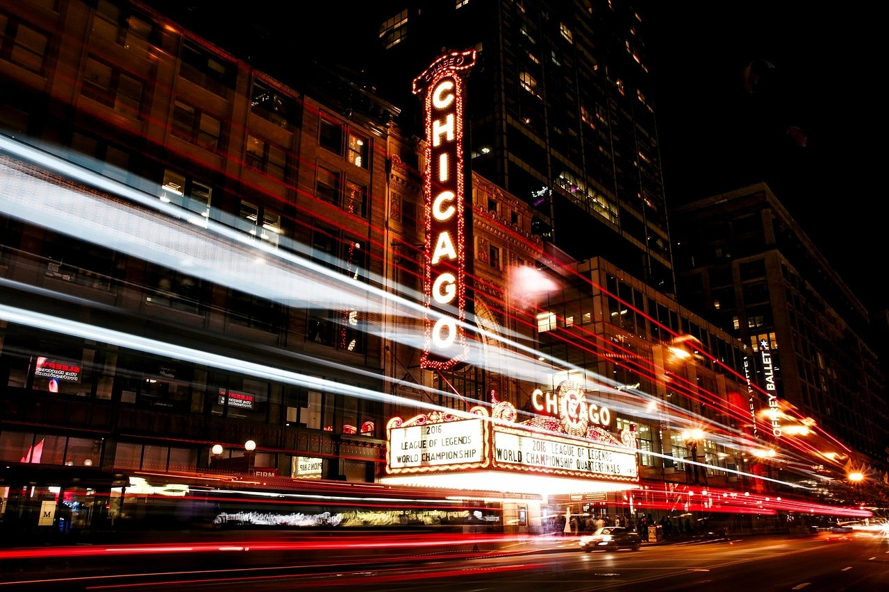 Chicago at night, showing the theater signs.