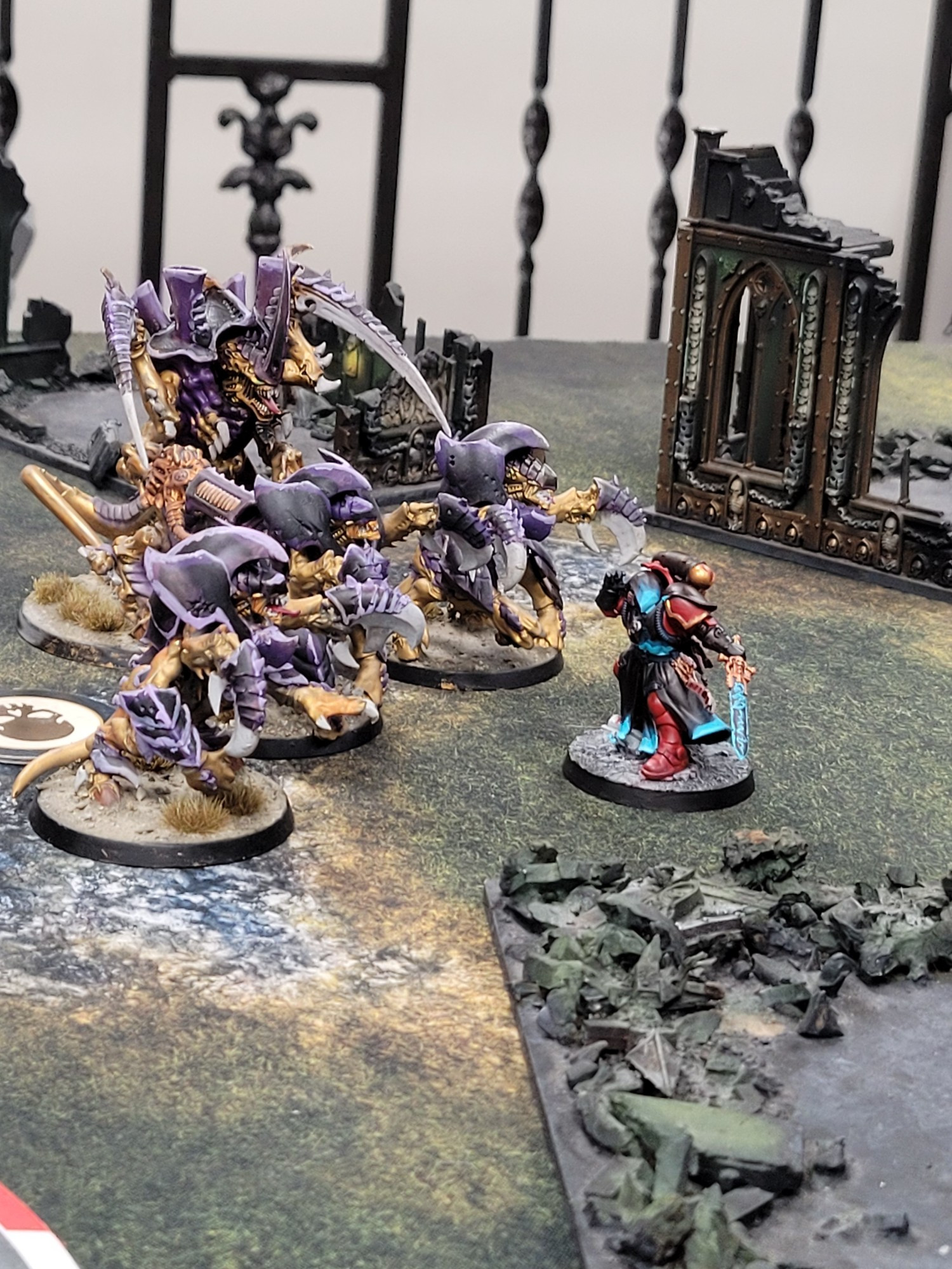 Phobos Lieutentant facing down three Hive Guard and a Hive Tyrant