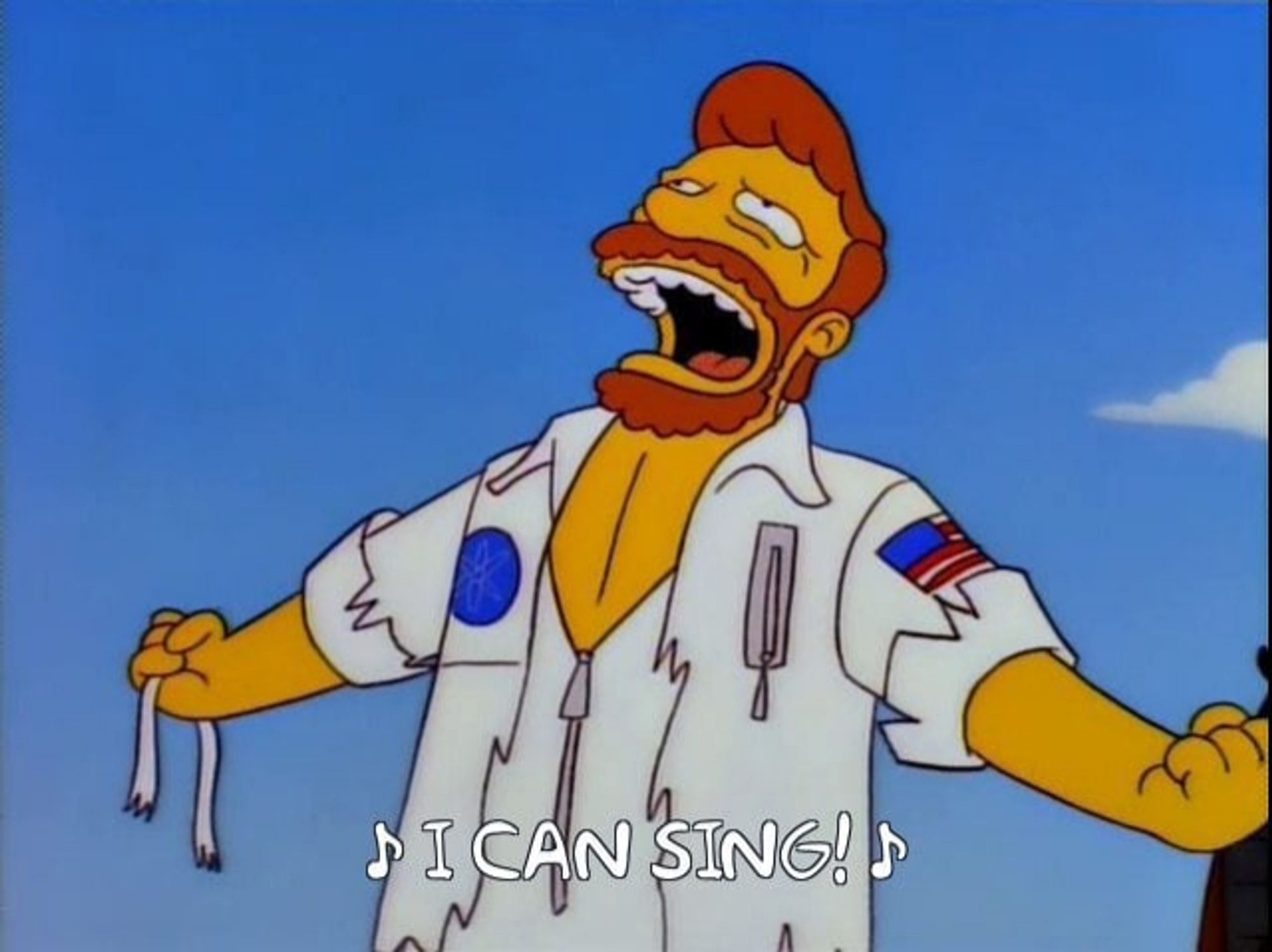 Troy McClure cantando 'I can sing!' en el musical del planeta de los simios de Los Simpsons