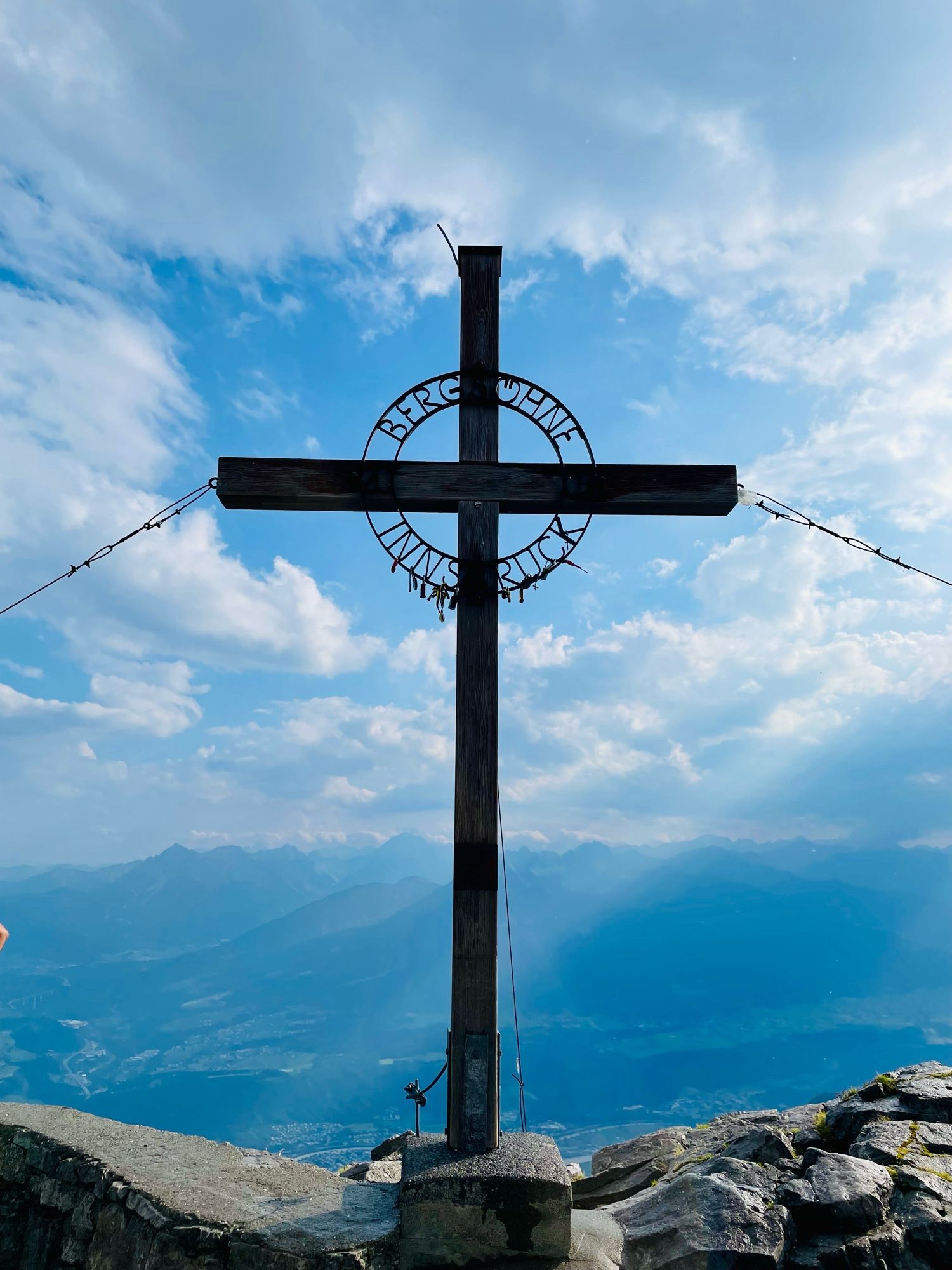 Top of Innsbruck sign and cross.