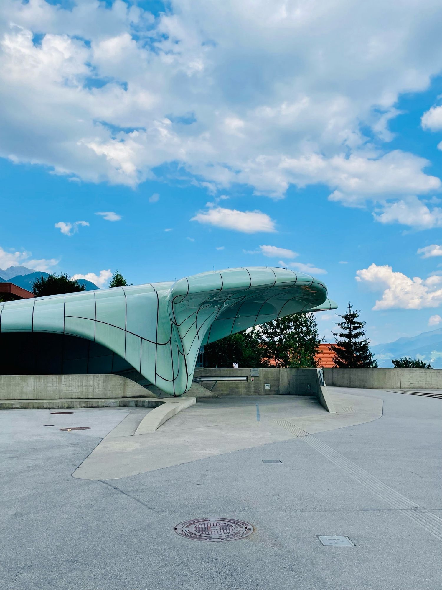 Fluid geometries of the station’s design mirrors glacial formations of the mountains.