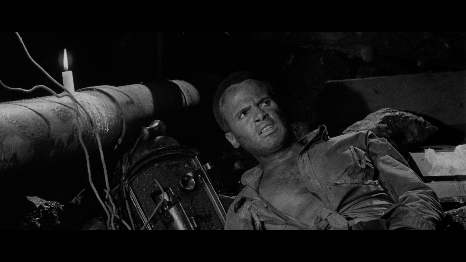 Harry Belafonte as a minder trapped underground in the film The World The Flesh and The Devil (1959), making a facial expression with at least a passing resemblance to Walter Goggins expressing incredulity.