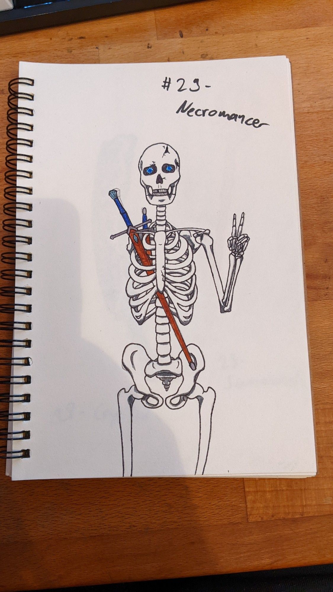 A traditional drawing with markers for swordtember. It's a reanimated skeleton with glowing blue eyes, holding up its left hand in a peace sign. The skeleton is missing its entire right arm and a rib on the right side. A sword with blue leather grip in a brown leather sheath is protruding from the skeleton's chest through the place of the missing rib.