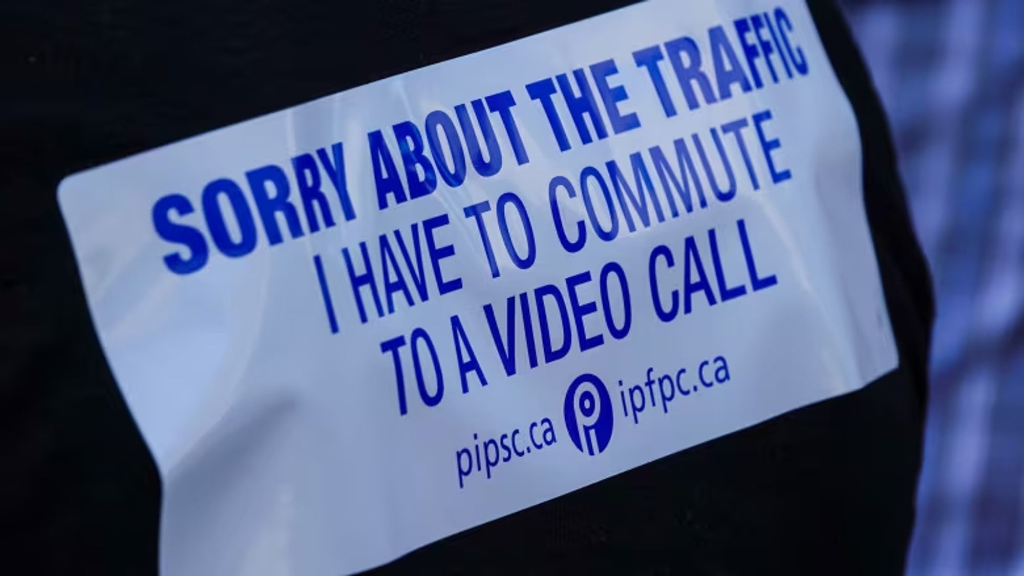 Sigh that reads "Sorry about the traffic. I have to commute to a video call."