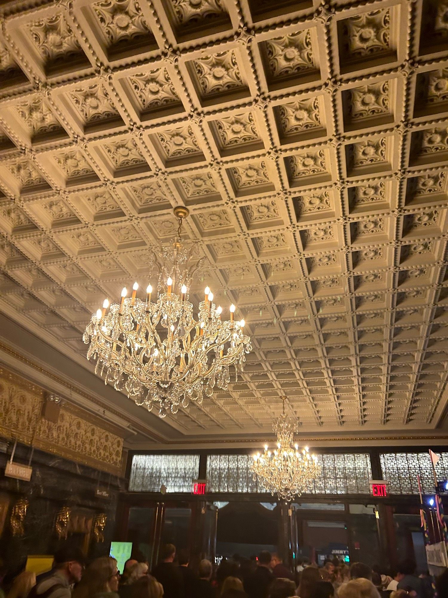 Decorative ceiling and chandeliers in Hudson Theatre entranceway