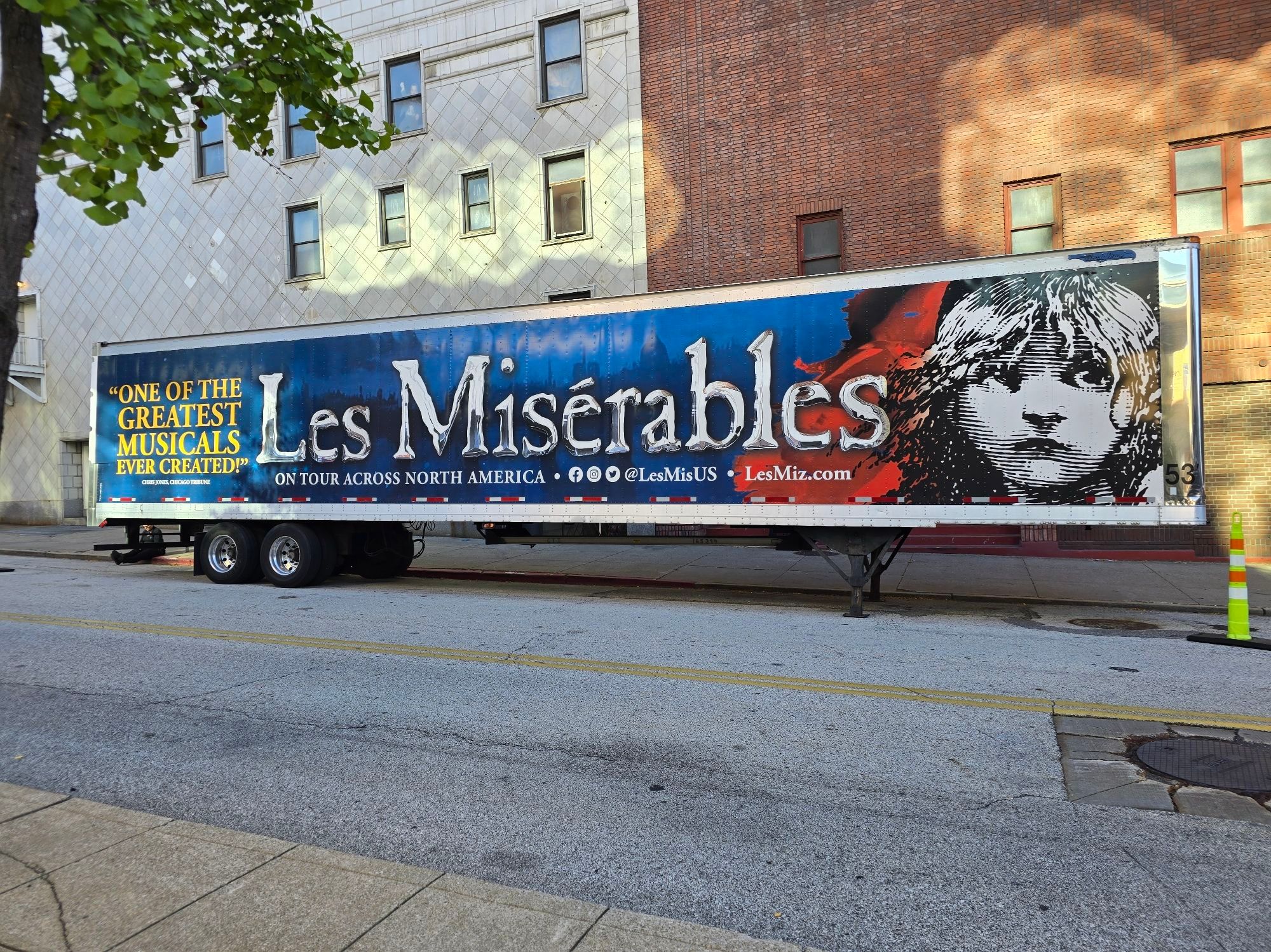 A semi trailor branded for the Les Mis show.