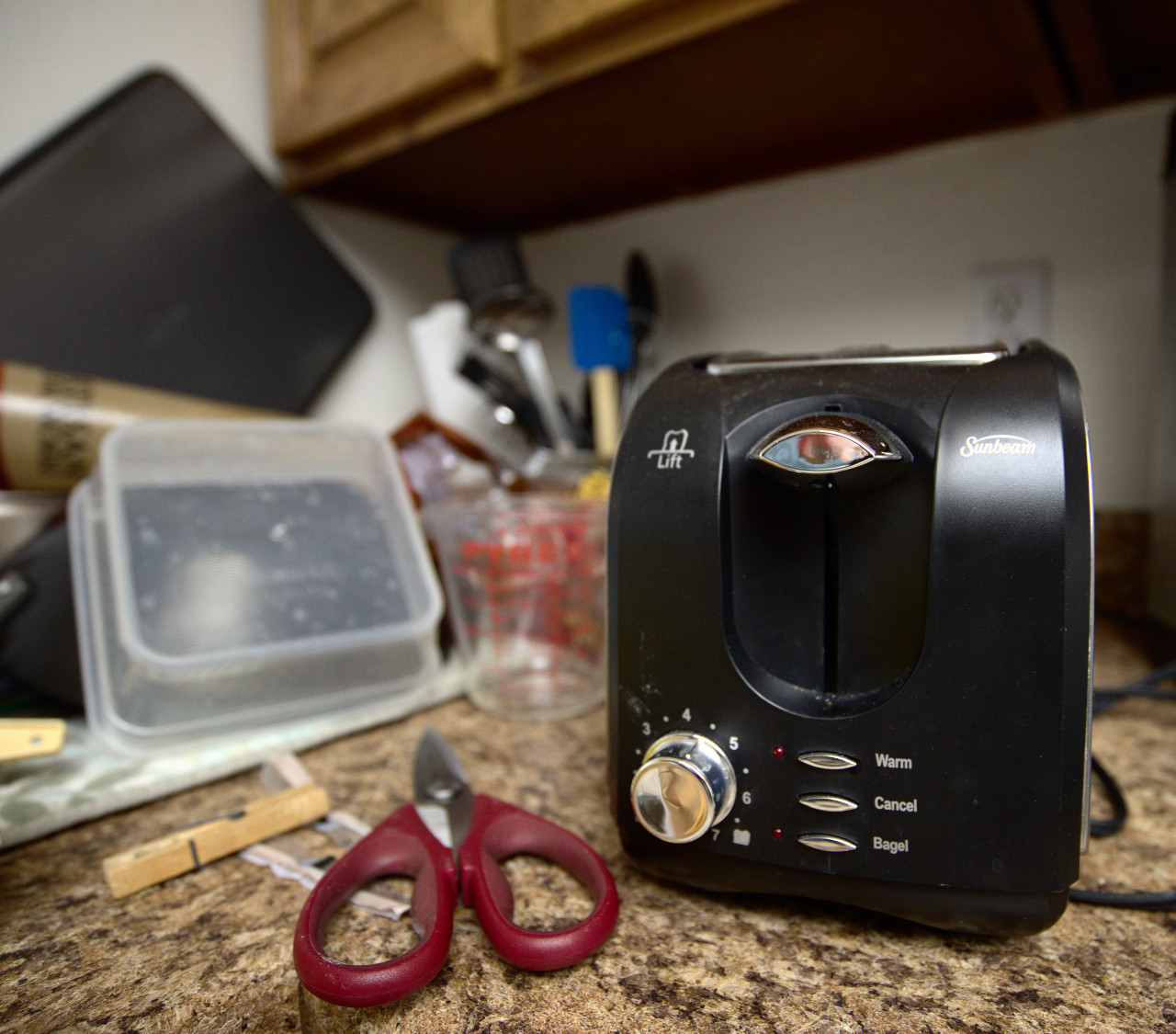 Toaster, scissors, dishes, counter top - another Sunday morning...