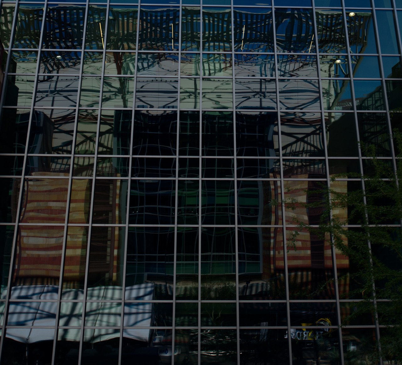 Building reflected in windows of another building downtown Phoenix AZ USA