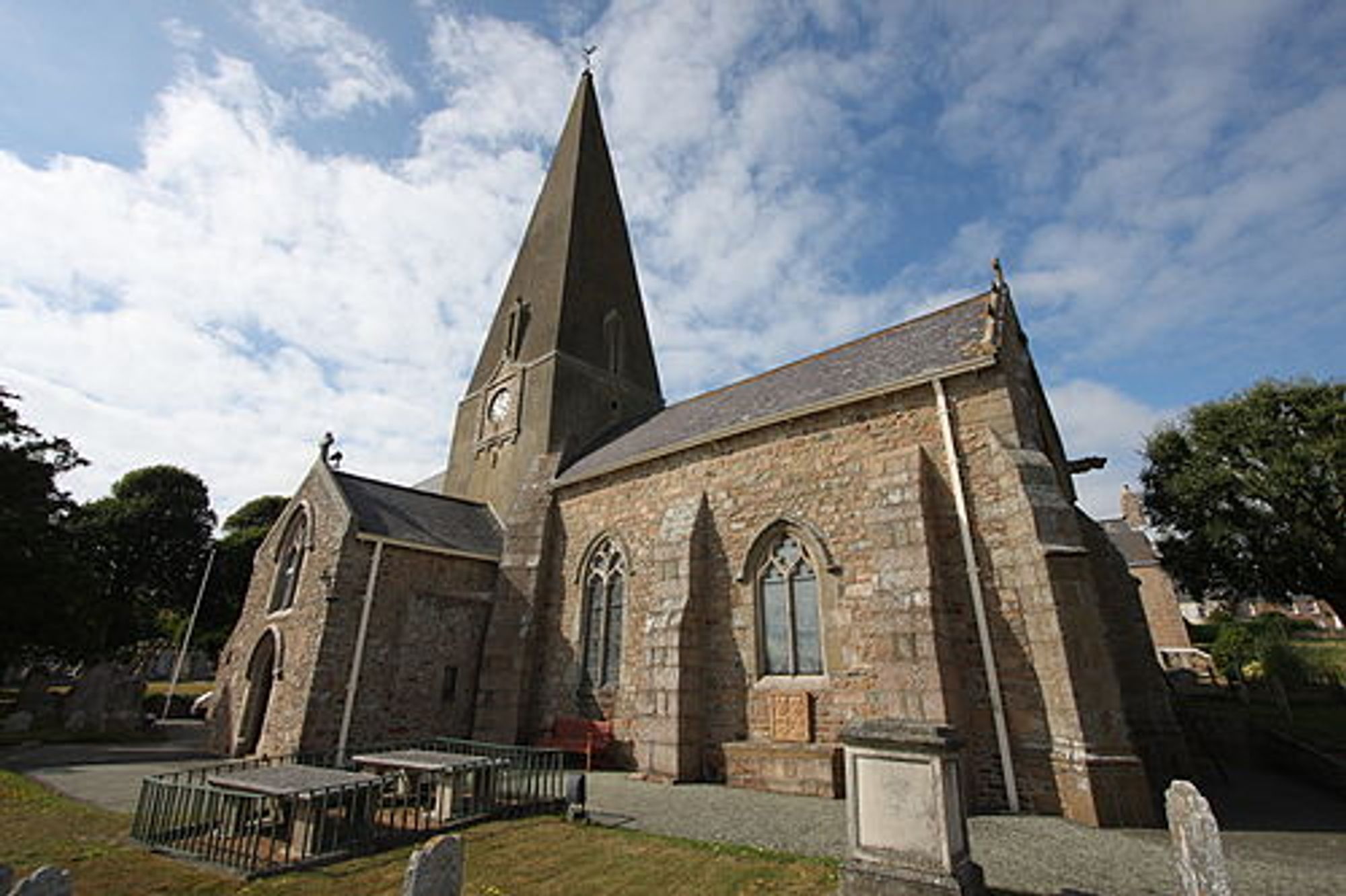 An image of Parish Church of St Clement from Wikipedia
<a href="https://commons.wikimedia.org/wiki/File:St_clements_church_jersey.JPG">Image</a> licensed under <a href="https://creativecommons.org/licenses/by/3.0" >CC BY 3.0</a? by <a href="//commons.wikimedia.org/wiki/User:Danrok" title="User:Danrok">Danrok</a>